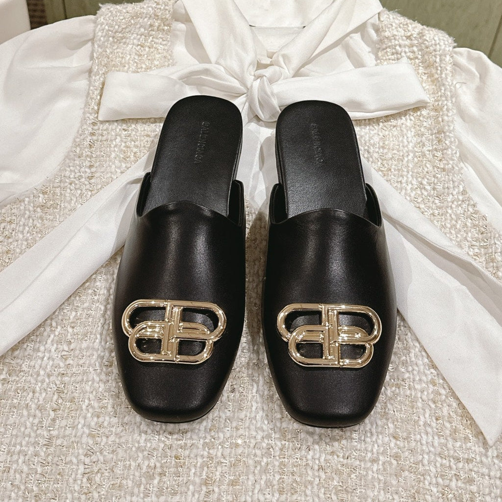 FLAT MULES IN BLACK SMOOTH CALFSKIN GOLD BUCKLE - 34