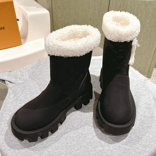 ANKLE BOOTS IN BLACK EMBOSSED CALFSKIN AND WHITE SHEARLING - 35