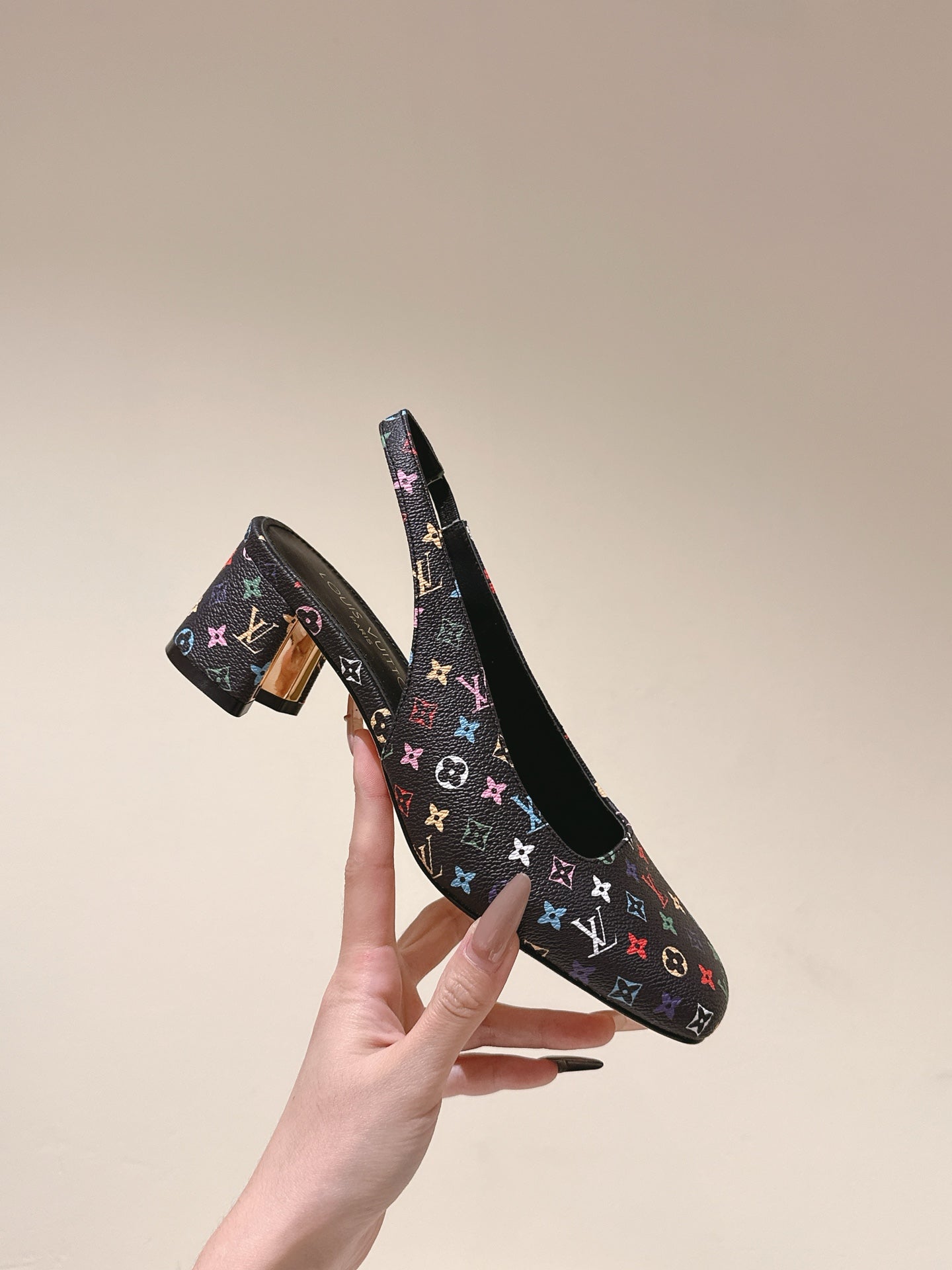 SWING SLINGBACK PUMP 55 MM IN BLACK MONOGRAM CALFSKIN - 35