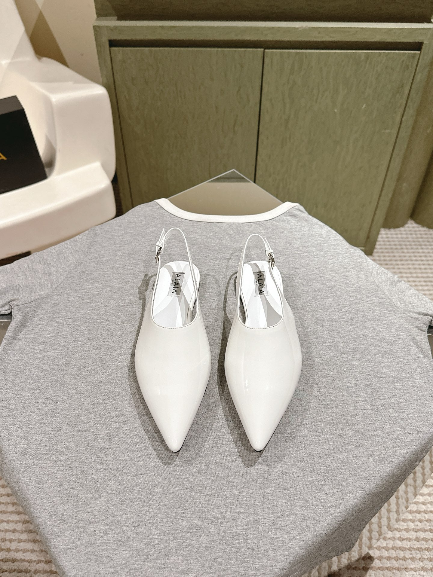 ALAIA SLINGBACK 25S IN WHITE PATENT LEATHER - 35