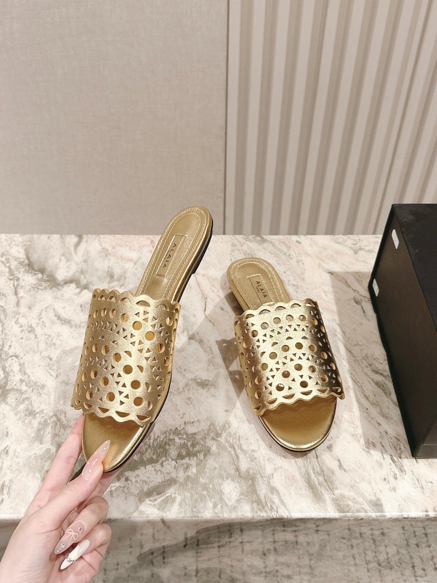 ALAIA PERFORATED SLIDE SANDALS 25S IN LIGHT GOLD LAMBSKIN - 35