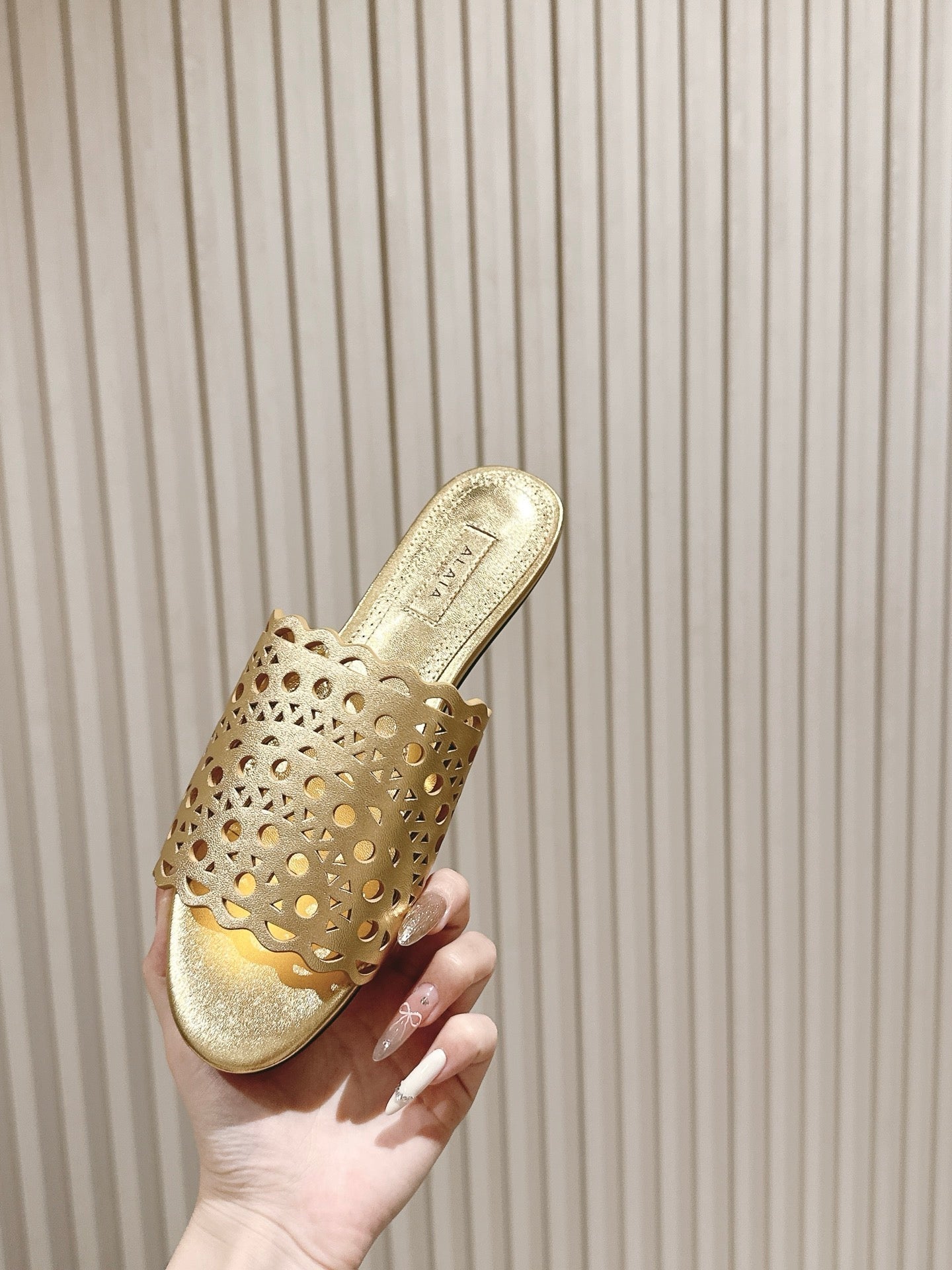 ALAIA PERFORATED SLIDE SANDALS 25S IN LIGHT GOLD LAMBSKIN - 35
