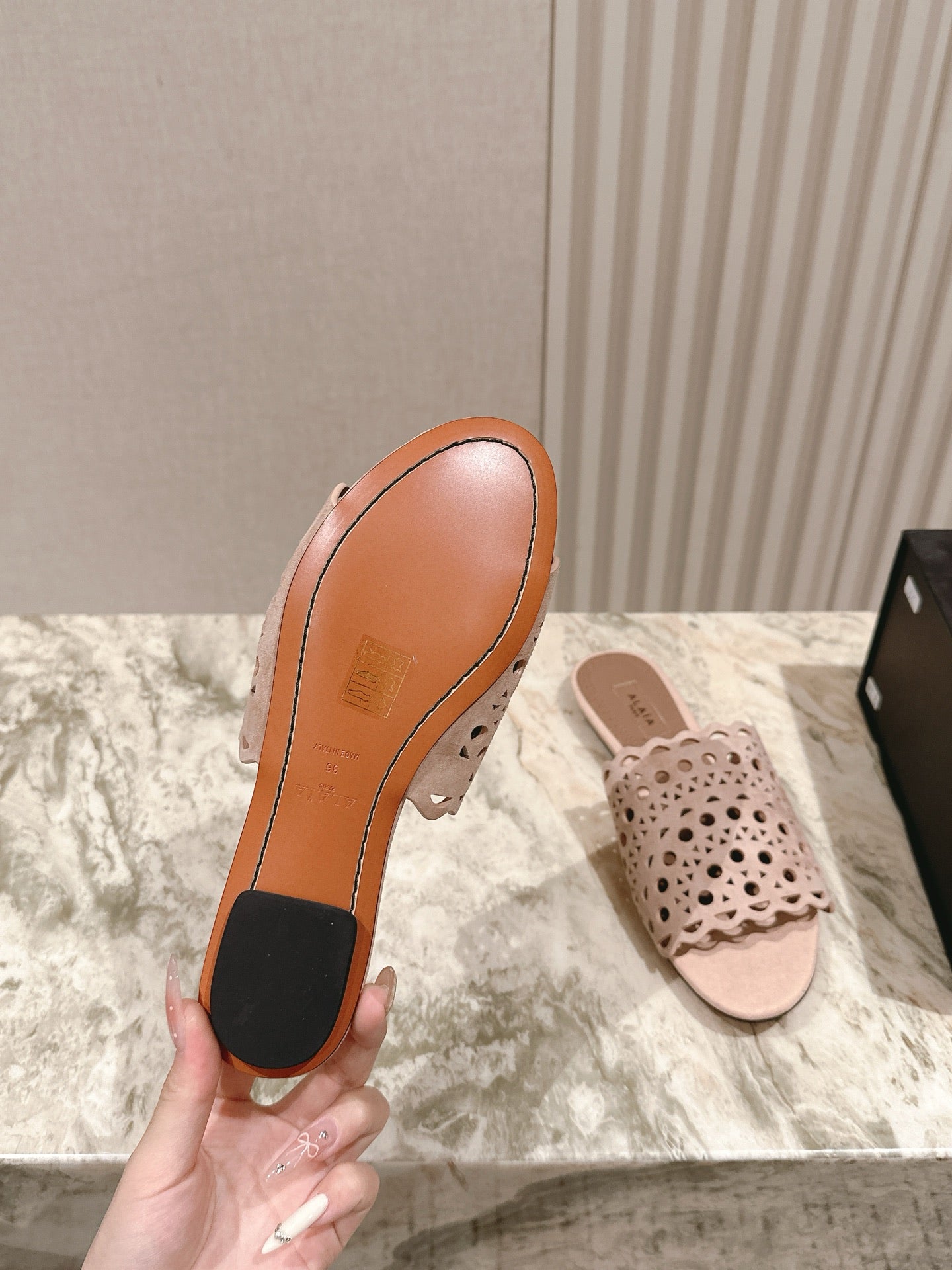 ALAIA PERFORATED SLIDE SANDALS 25S IN PINK BEIGE SUEDE - 35