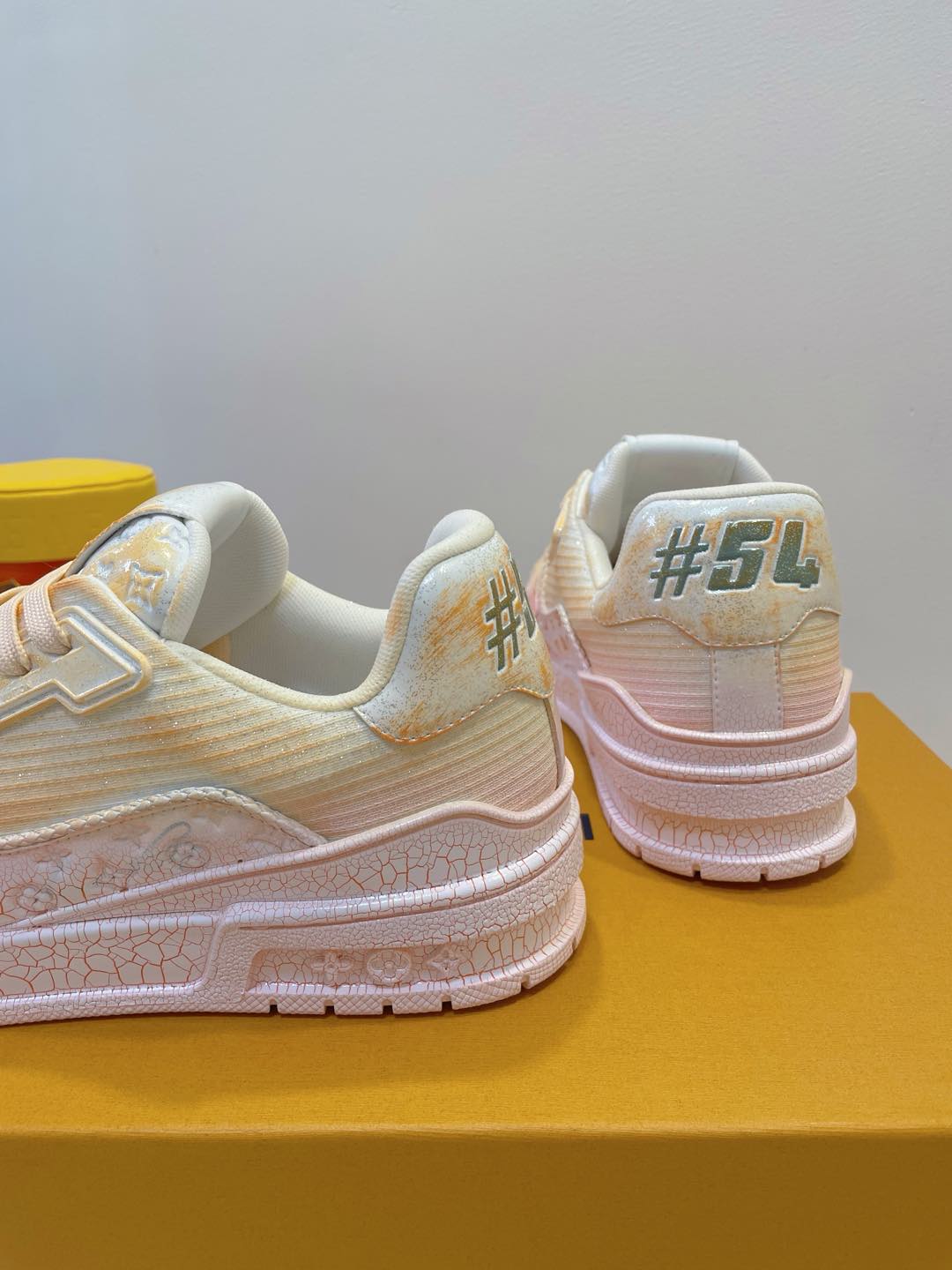 LV TRAINER MAXI SNEAKER IN LIGHT PINK OMBRE ORANGE EMBOSSED CALFSKIN - 35