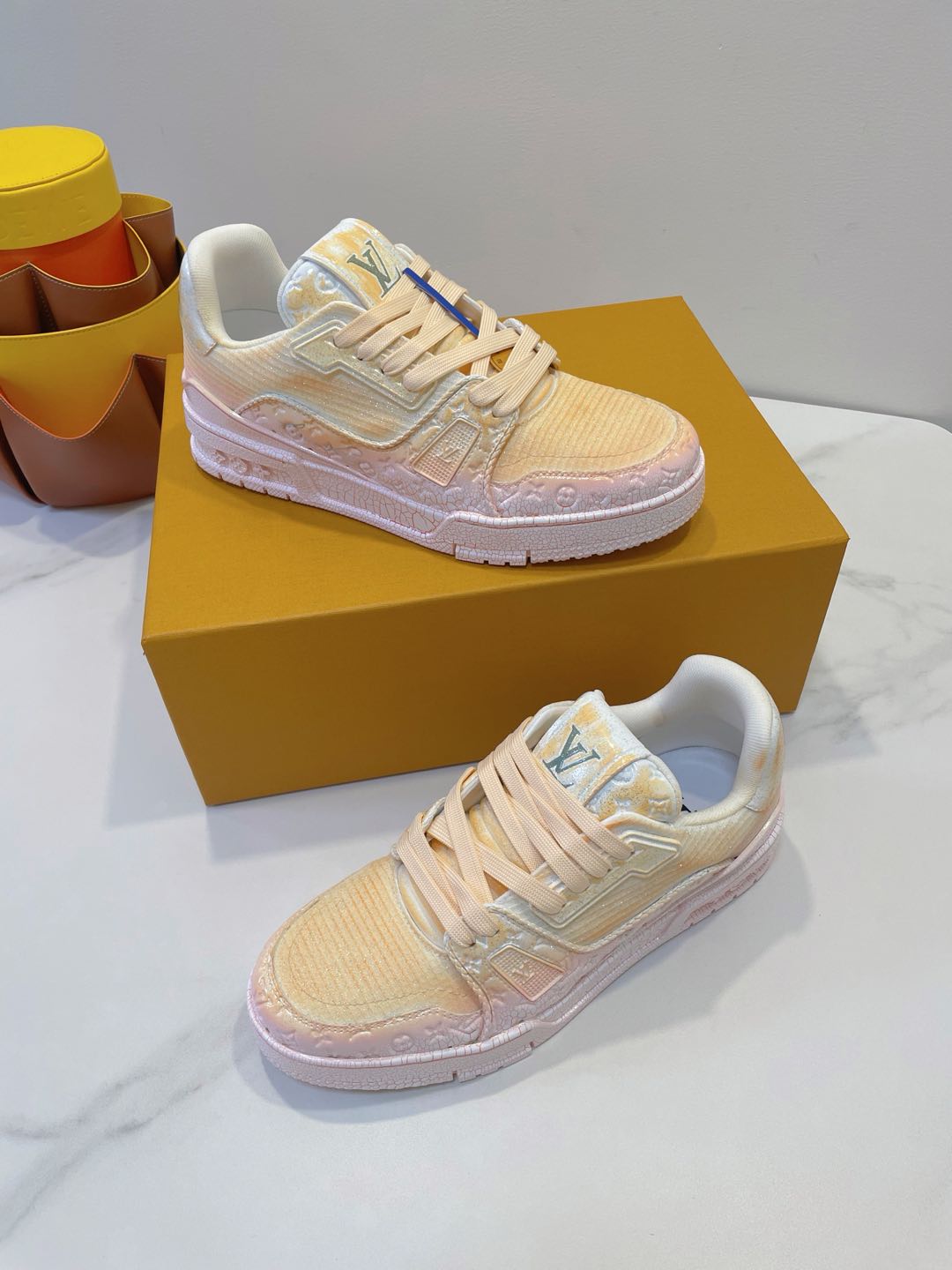 LV TRAINER MAXI SNEAKER IN LIGHT PINK OMBRE ORANGE EMBOSSED CALFSKIN - 35