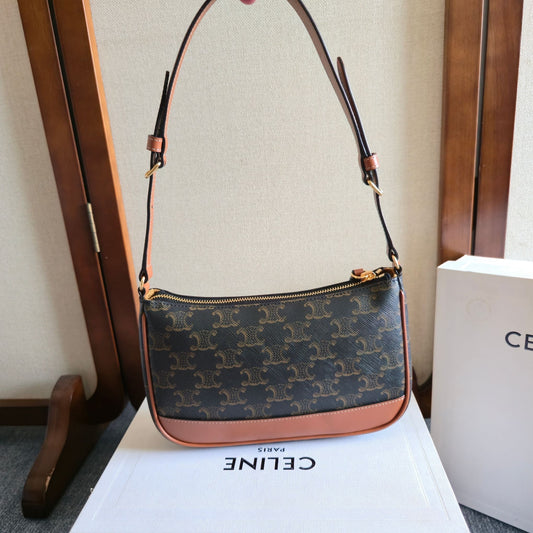 СУМКА CELINE 25S SHOULDER BAG 21MM З ЧОРНОГО ПОЛОТНА TRIOMPHE ТА КОРИЧНЕВОЇ ТЕЛЯЧОЇ ШКІРИ
