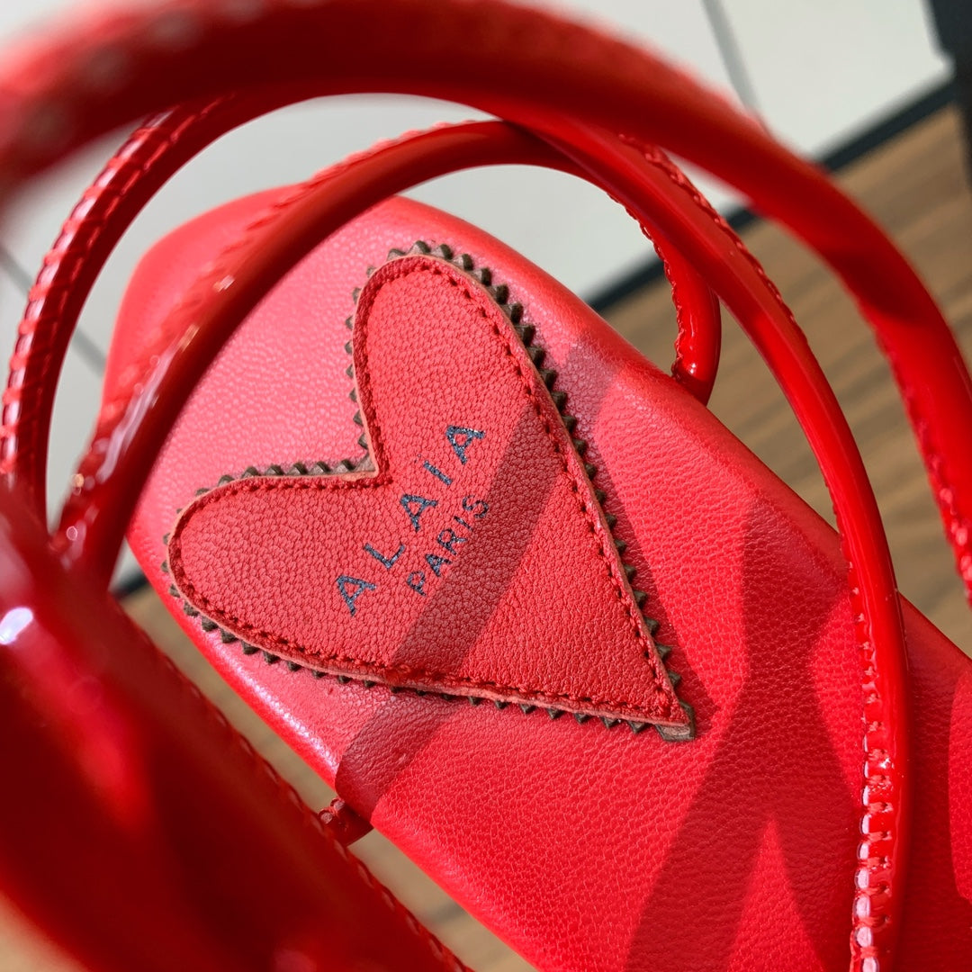 ALAIA BANQUET WEDGE SANDALS IN CHERRY RED LAMBSKIN WITH RED HEART - 35