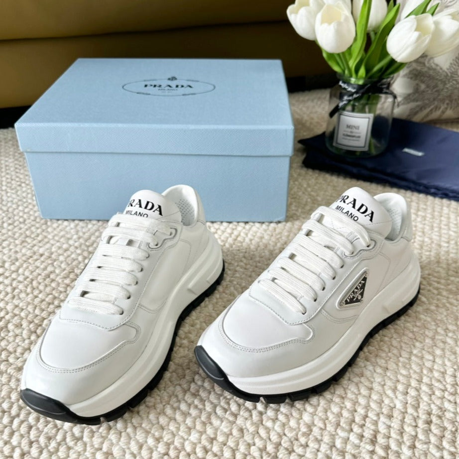 PRA THICK SOLE SNEAKER WHITE AND BLACK LOGO CALFSKIN - 35