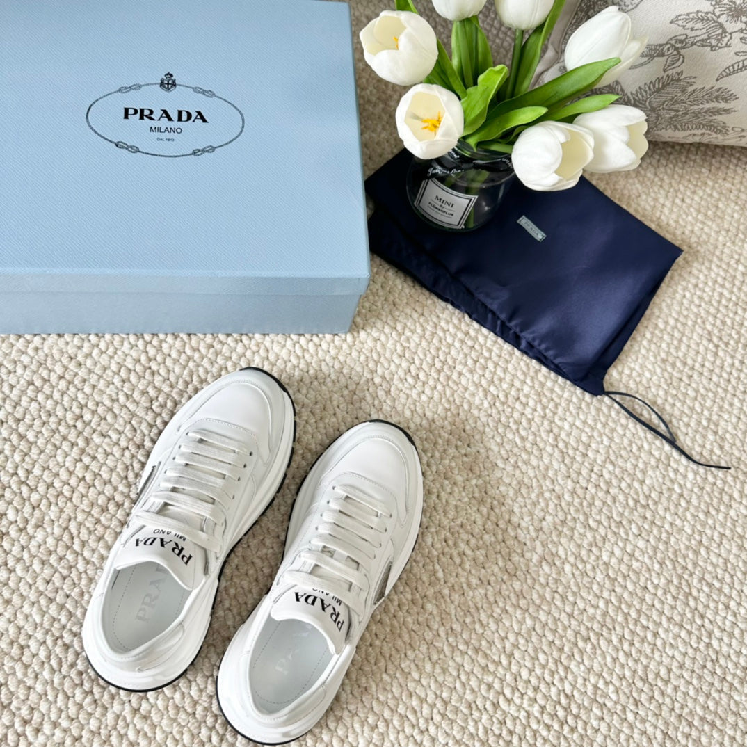 PRA THICK SOLE SNEAKER WHITE AND BLACK LOGO CALFSKIN - 35
