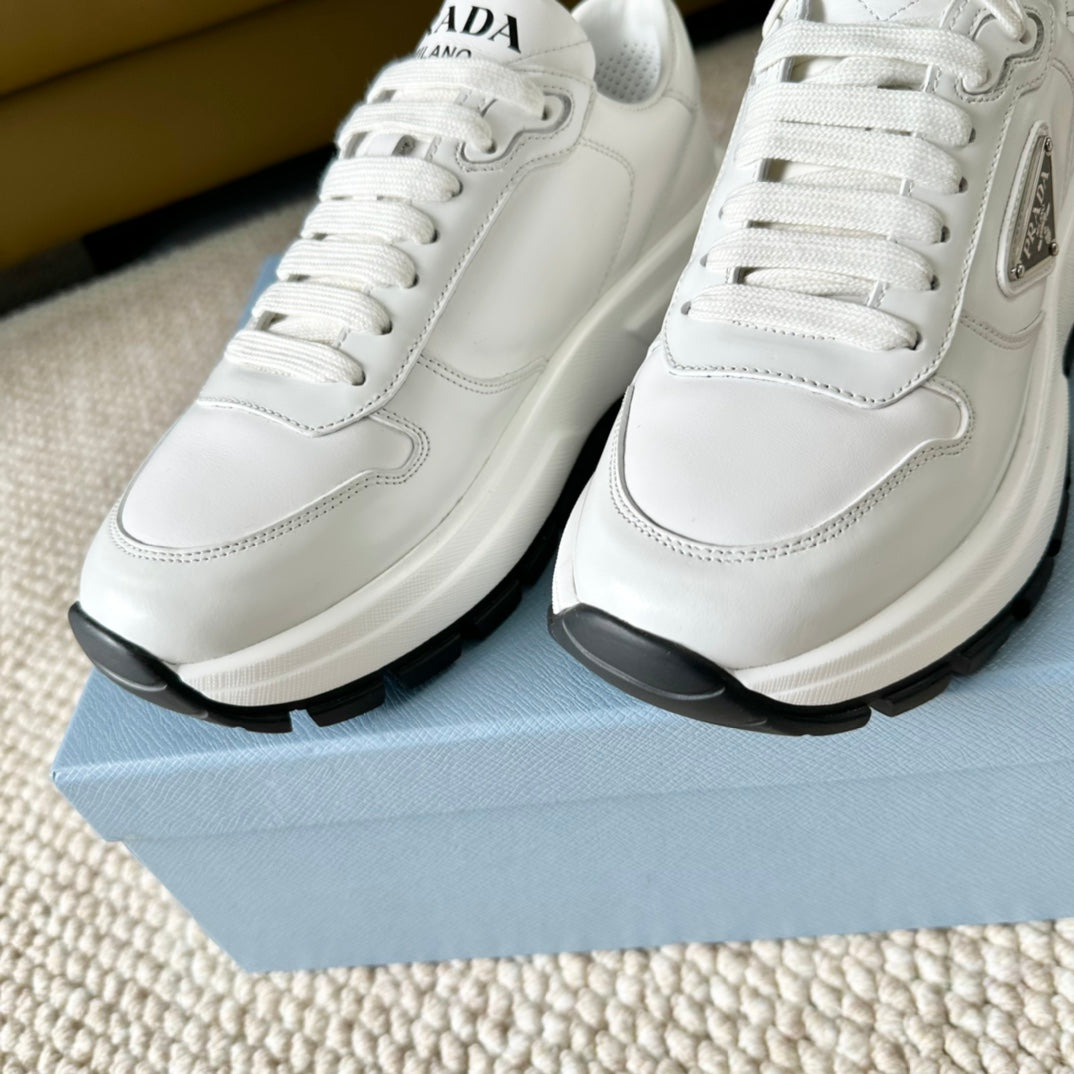 PRA THICK SOLE SNEAKER WHITE AND BLACK LOGO CALFSKIN - 35