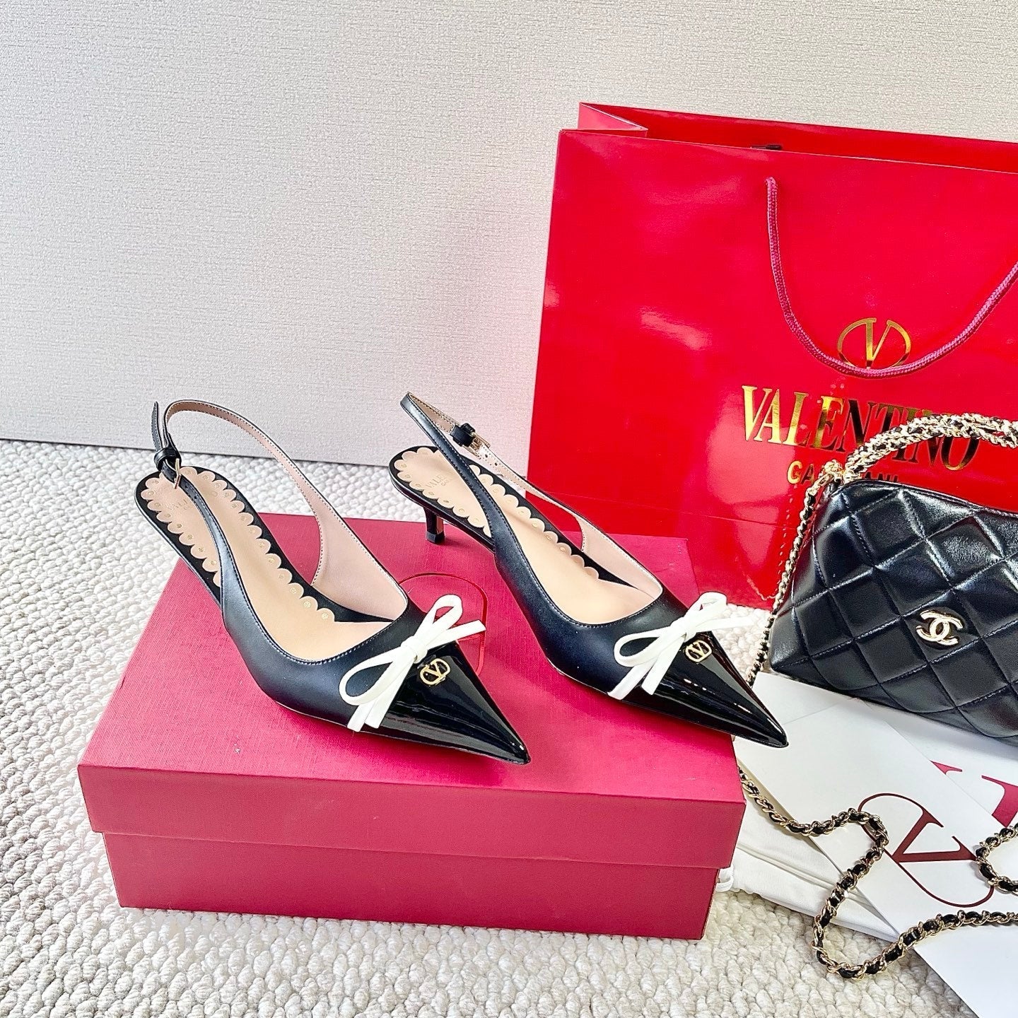 VLTN HIGH SLINGBACK 25S 40 MM IN BLACK LAMBSKIN WITH BOW - 35