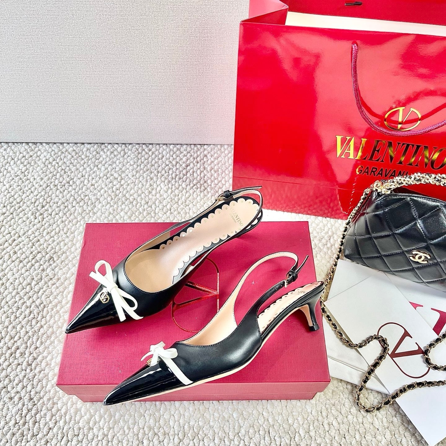 VLTN HIGH SLINGBACK 25S 40 MM IN BLACK LAMBSKIN WITH BOW - 35