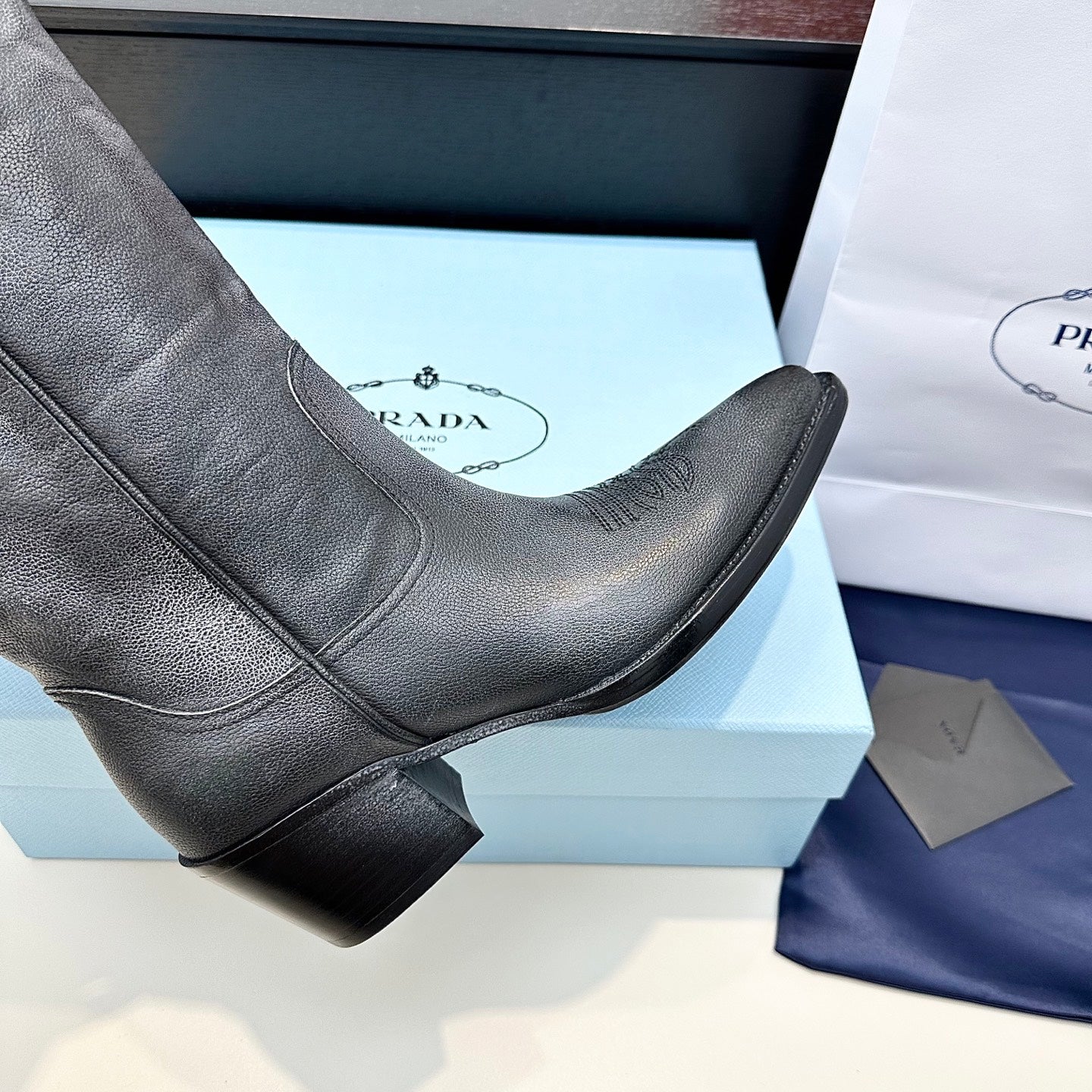 PRADA 25S POINTED-TOE LOW-CUT BOOTS IN BLACK COWHIDE - 35