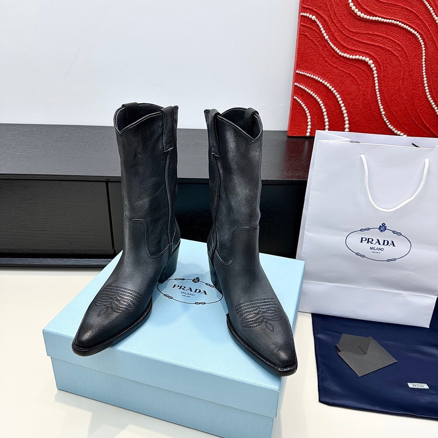 PRADA 25S POINTED-TOE LOW-CUT BOOTS IN BLACK COWHIDE - 35