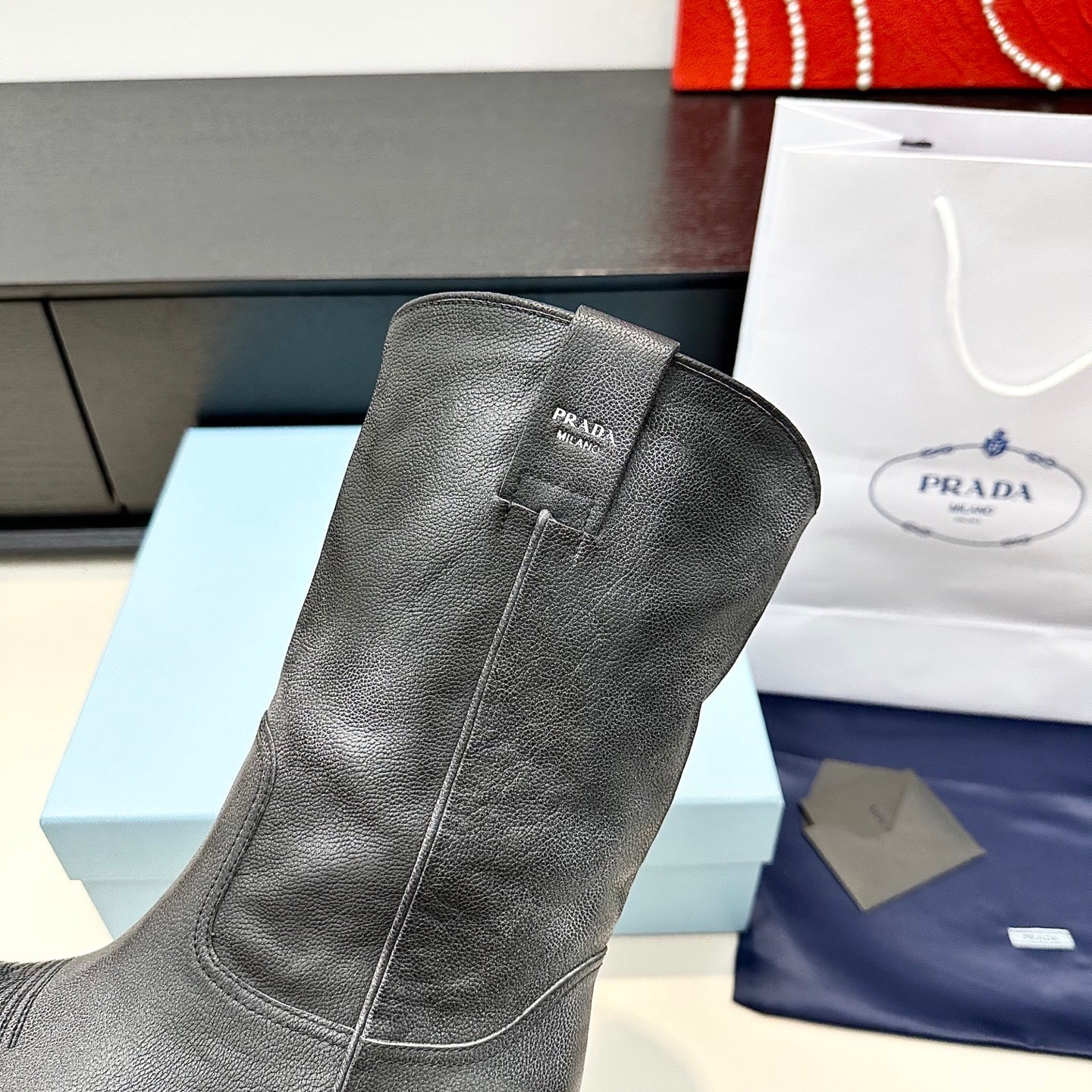 PRADA 25S POINTED-TOE LOW-CUT BOOTS IN BLACK COWHIDE - 35