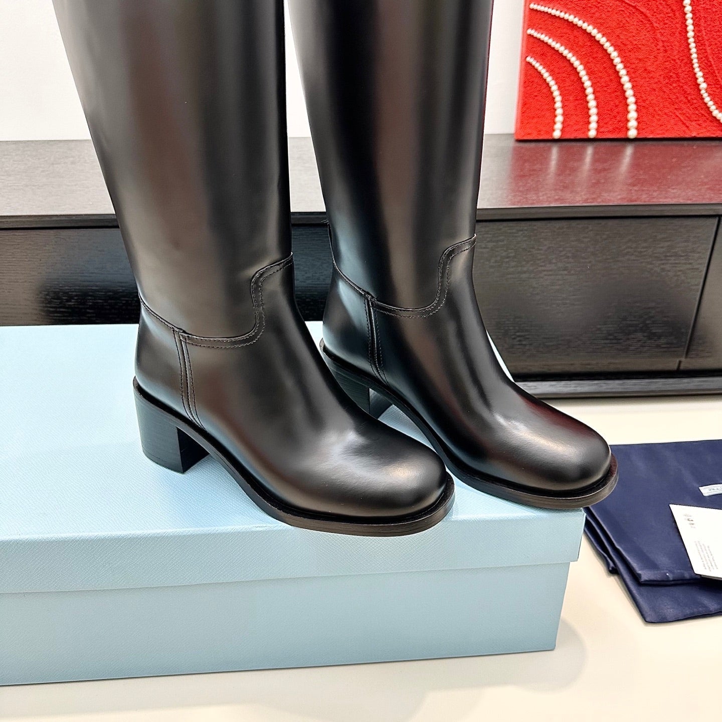 PRADA 25S HIGH-CUT BOOTS 55 MM IN BLACK CALFSKIN - 35