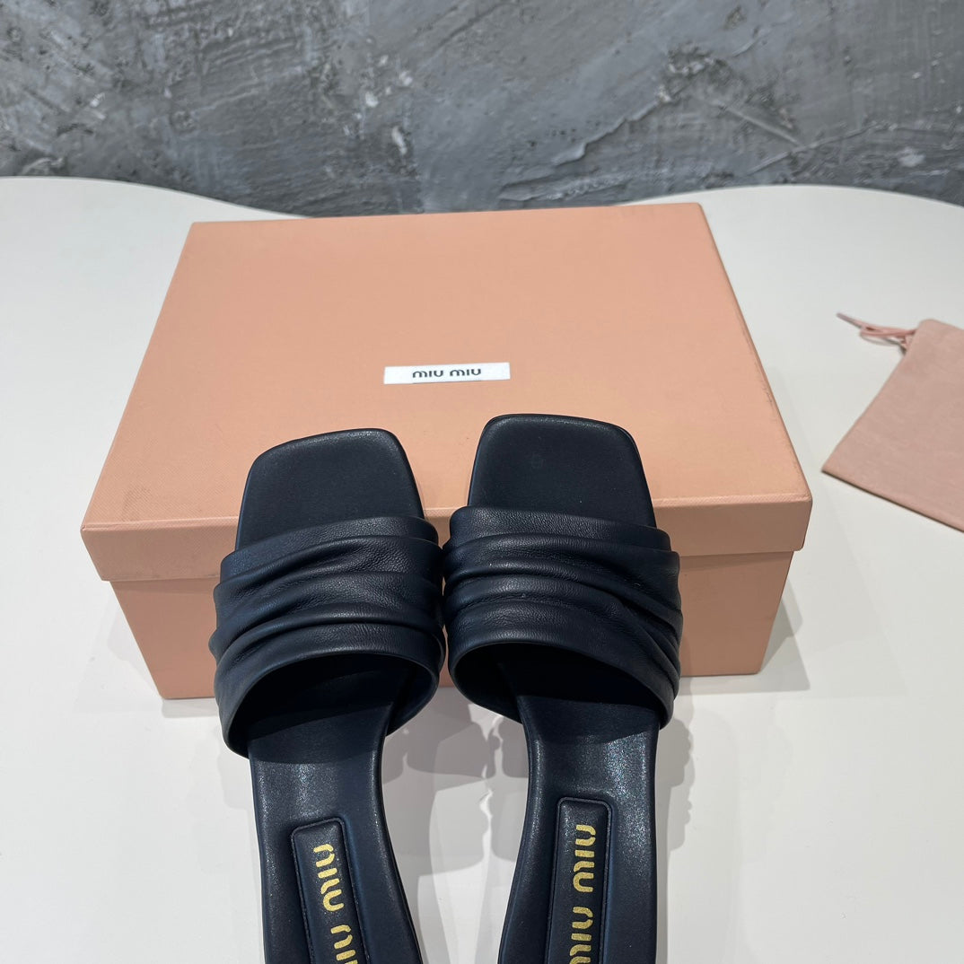 HIGH - HEEL BLACK SHEEPSKIN WITH STYLIZED STRAPS - 35
