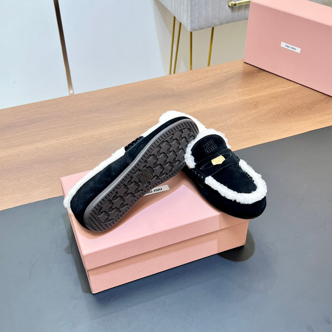 LOAFERS IN BLACK SUEDE AND WHITE SHEARLING TRIM - 35