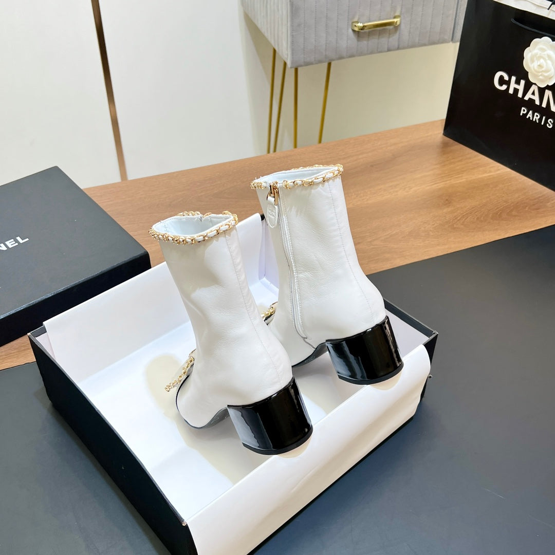 CHANEL 25S HEELED CHAIN BOOTS WITH BOW IN WHITE CALFSKIN GOLD HARDWRE - 35