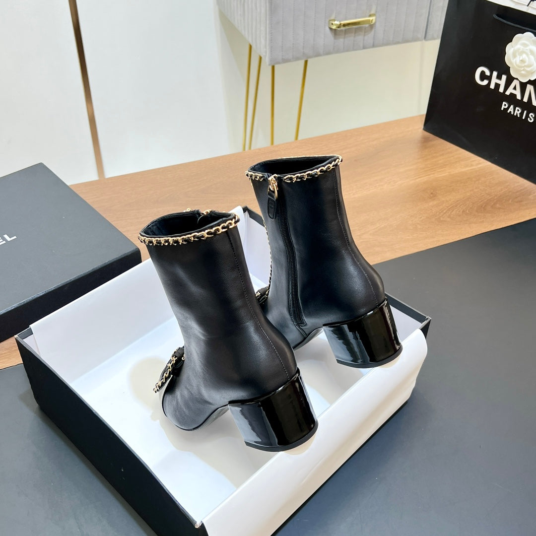 CHANEL 25S HEELED CHAIN BOOTS WITH BOW IN BLACK CALFSKIN GOLD HARDWRE - 35