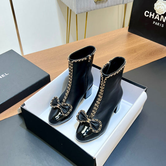 CHANEL 25S HEELED CHAIN BOOTS WITH BOW IN BLACK CALFSKIN GOLD HARDWRE - 35