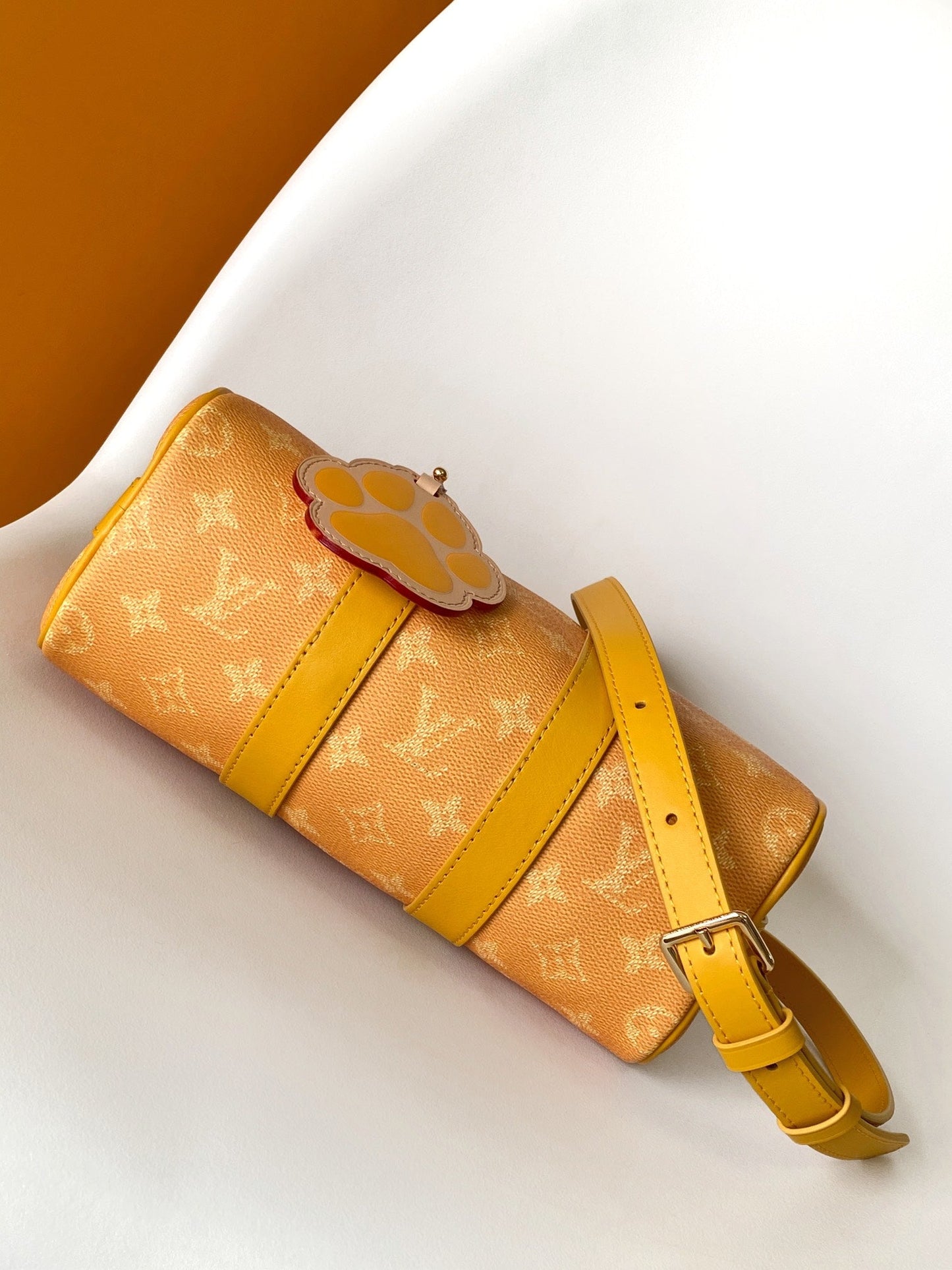 KEEPALL BANDOULIÈRE 25 IN ORANGE MONOGRAM HERITAGE CANVAS
