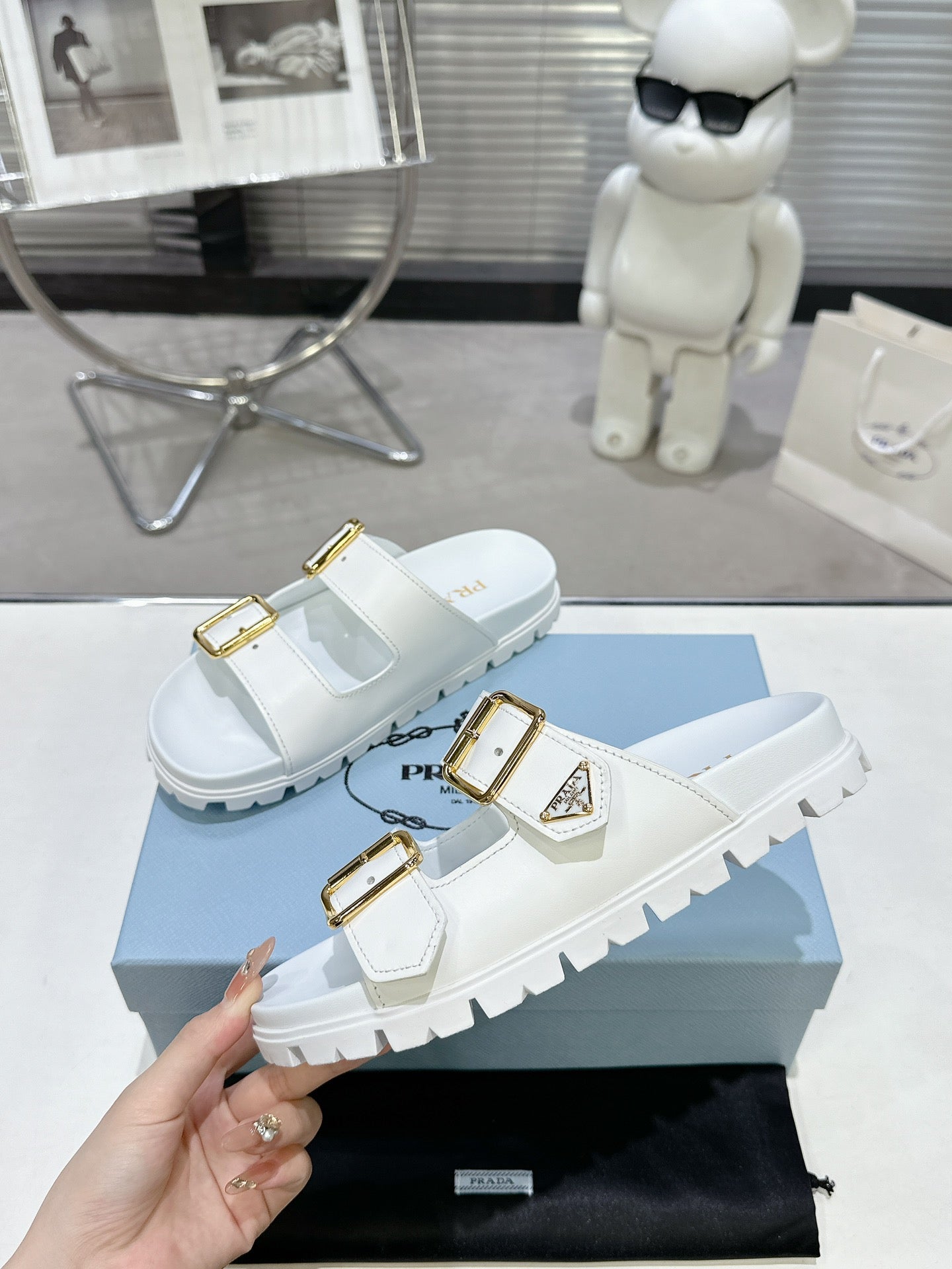 PRADA 25S STRAP SLIDES 30MM IN WHITE CALFSKIN GOLD HARDWARE - 35