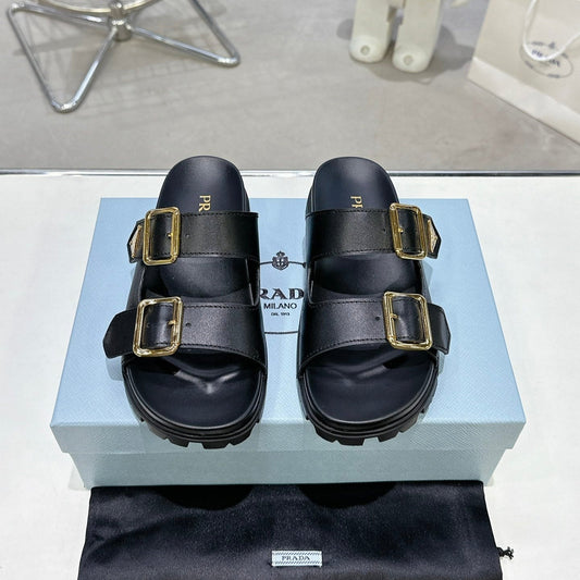 PRADA 25S STRAP SLIDES 30MM IN BLACK CALFSKIN GOLD HARDWARE - 35