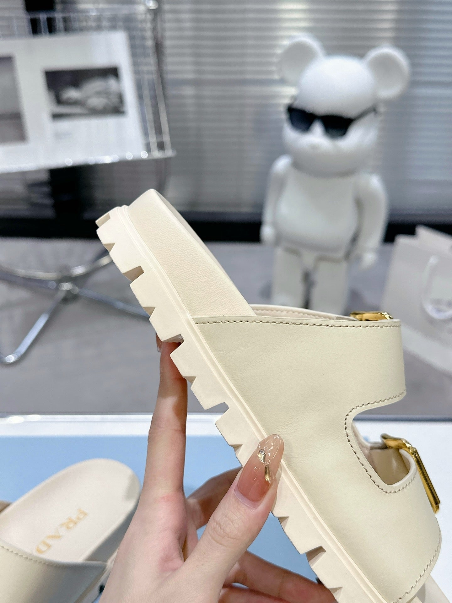 PRADA 25S STRAP SLIDES 30MM IN CREAM CALFSKIN GOLD HARDWARE - 35