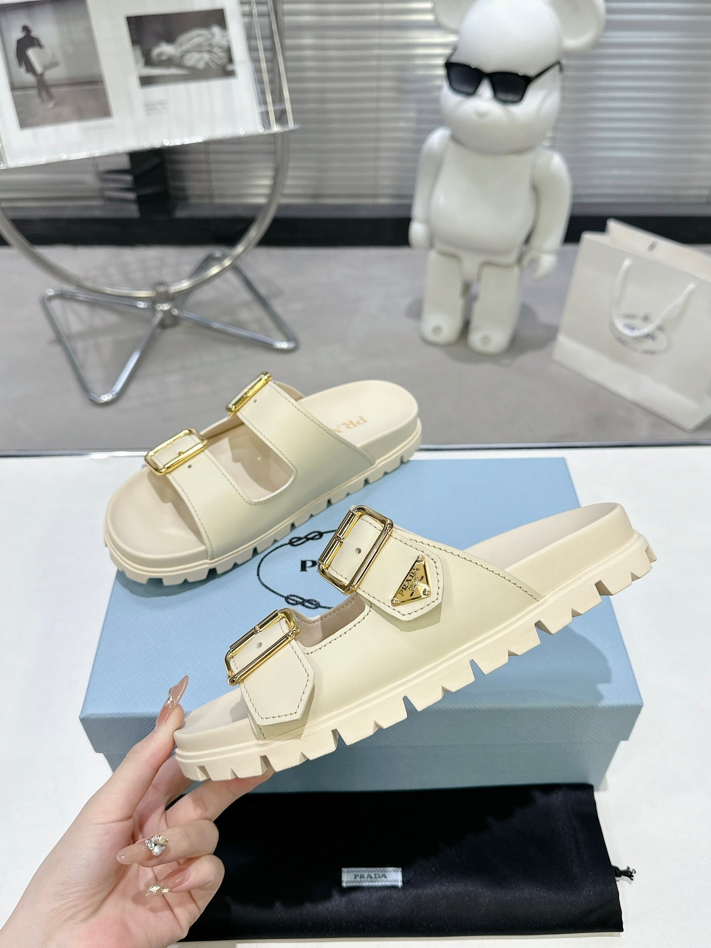 PRADA 25S STRAP SLIDES 30MM IN CREAM CALFSKIN GOLD HARDWARE - 35