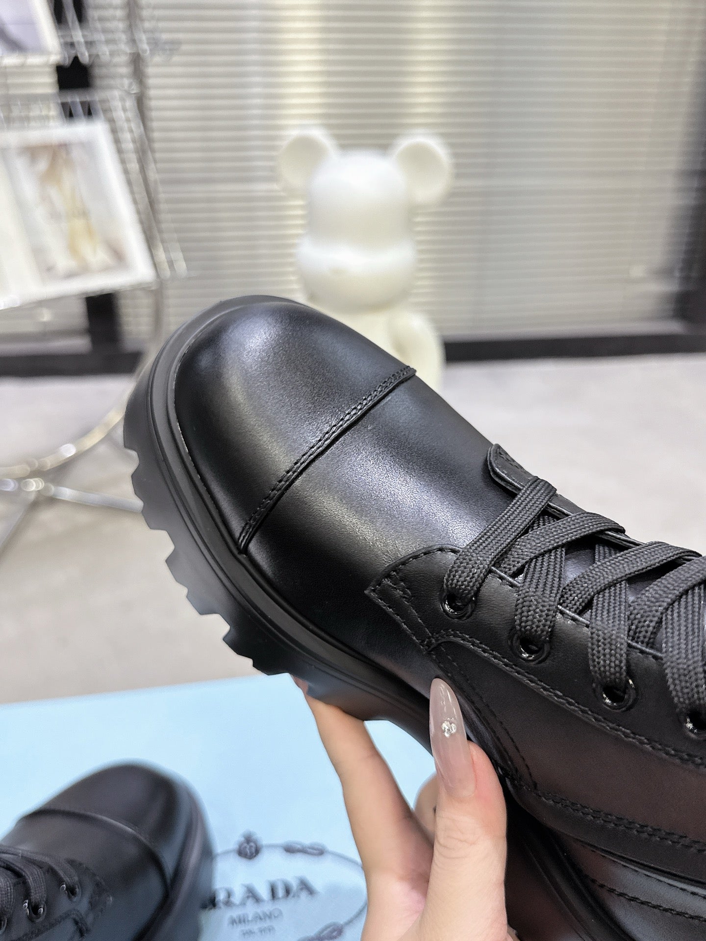 PRADA 25S WARRIOR BOOTS IN BLACK CALFSKIN - 35