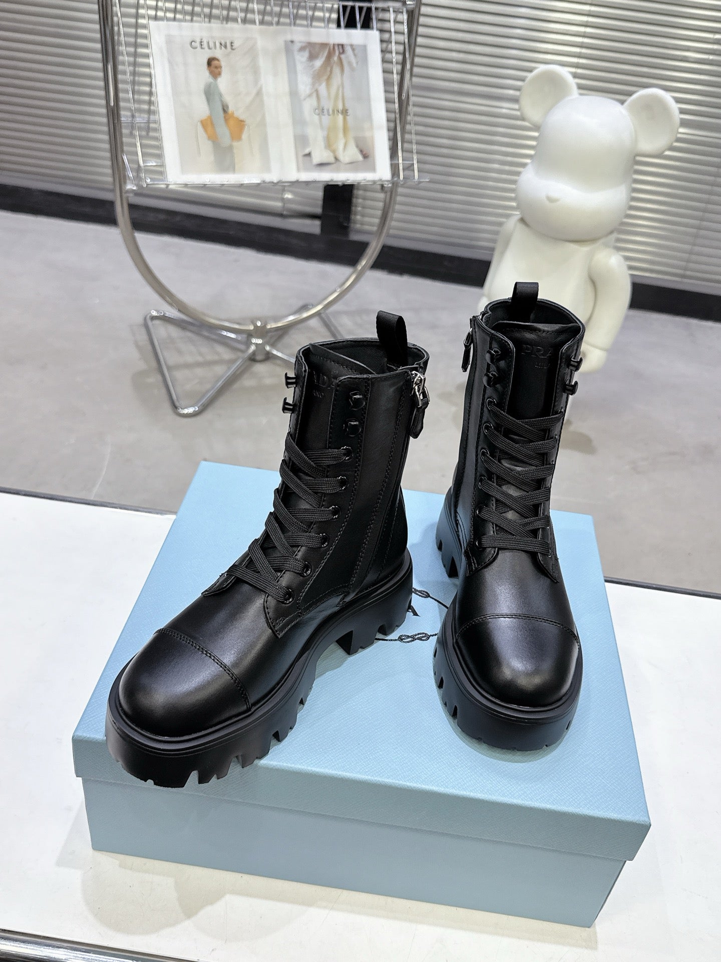 PRADA 25S WARRIOR BOOTS IN BLACK CALFSKIN - 35