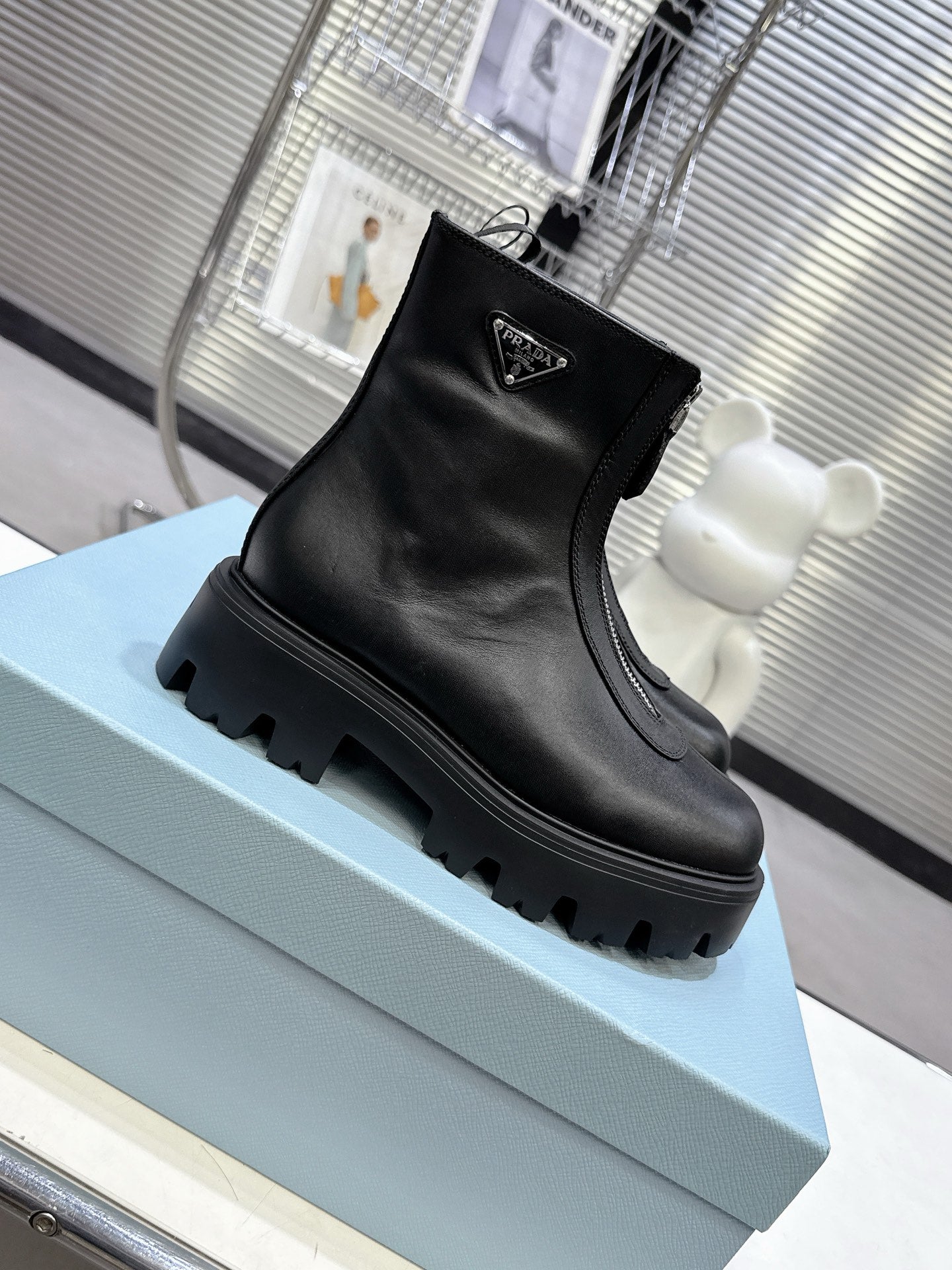 PRADA 25S ZIP-UP ANKLE BOOTS IN BLACK CALFSKIN - 35