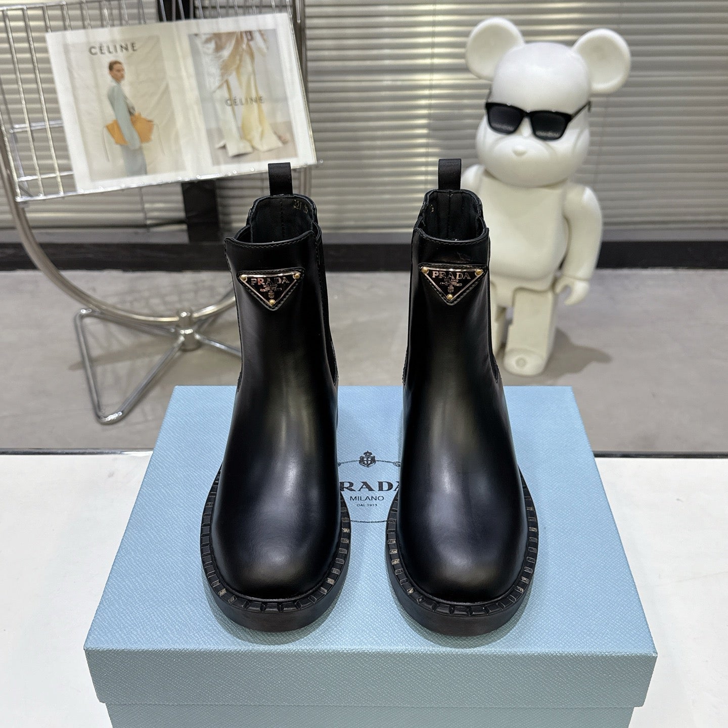 PRADA 25S RETRO PLATFORM MARTIN BOOTS IN BLACK CALFSKIN - 35