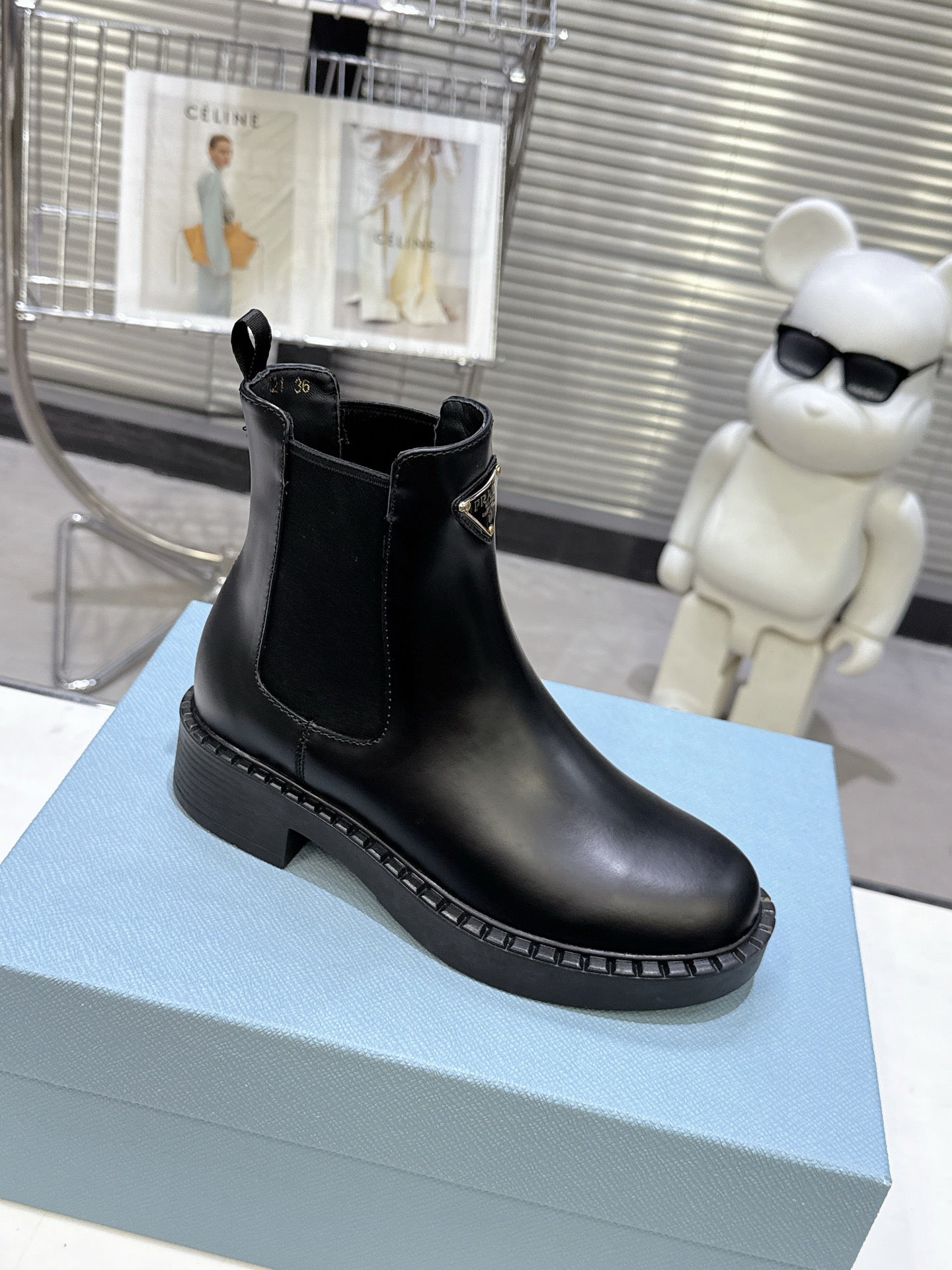 PRADA 25S RETRO PLATFORM MARTIN BOOTS IN BLACK CALFSKIN - 35