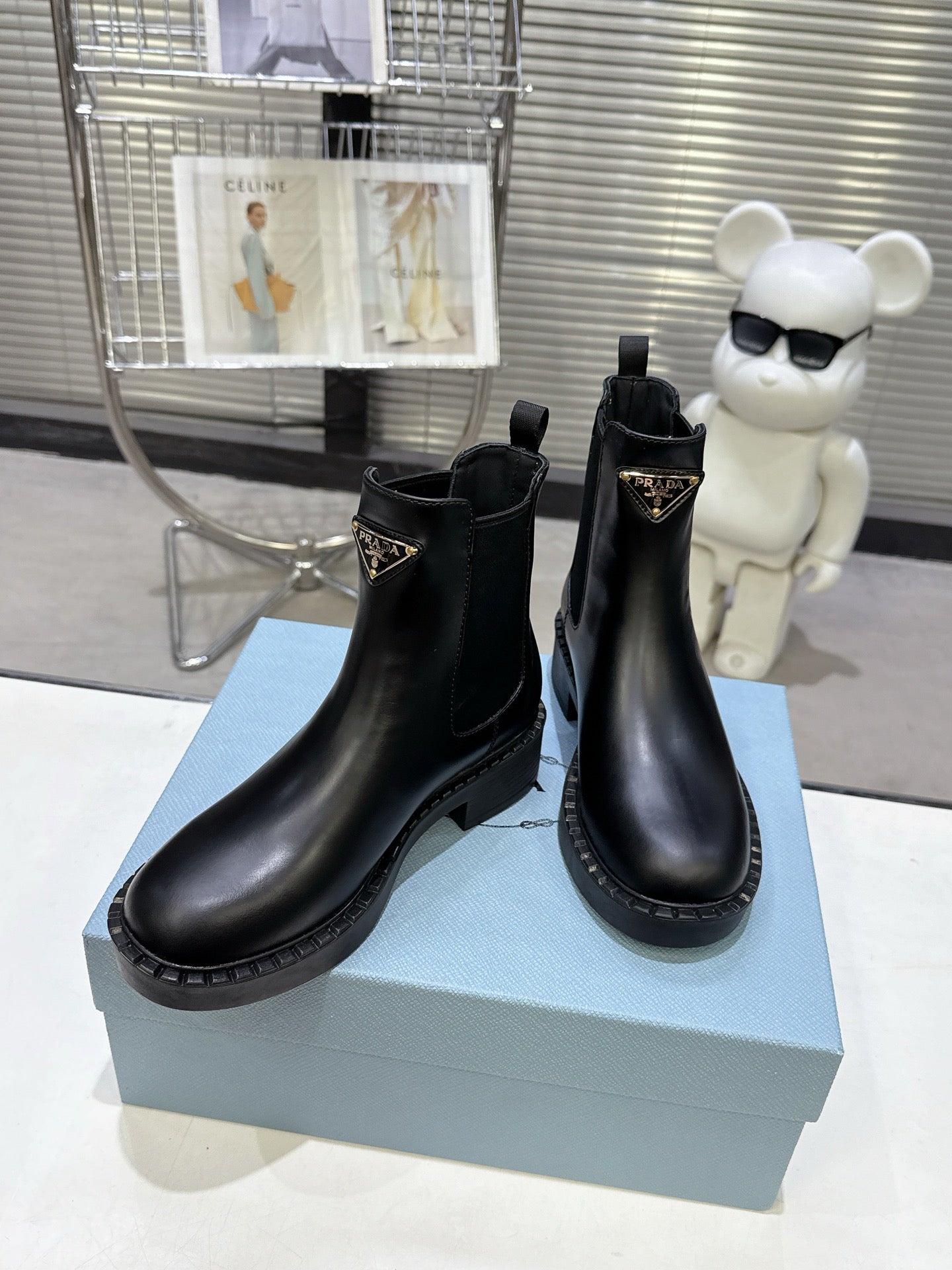 PRADA 25S RETRO PLATFORM MARTIN BOOTS IN BLACK CALFSKIN - 35