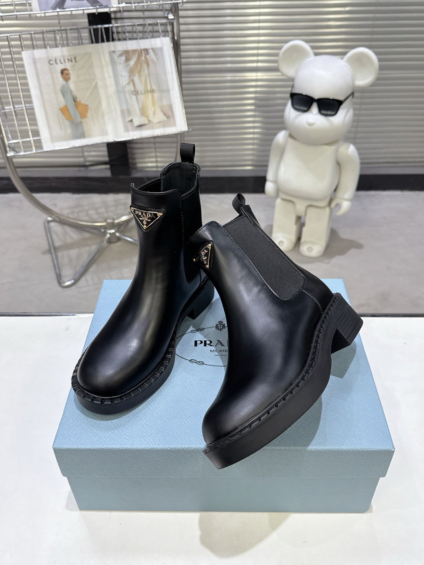 PRADA 25S RETRO PLATFORM MARTIN BOOTS IN BLACK CALFSKIN - 35