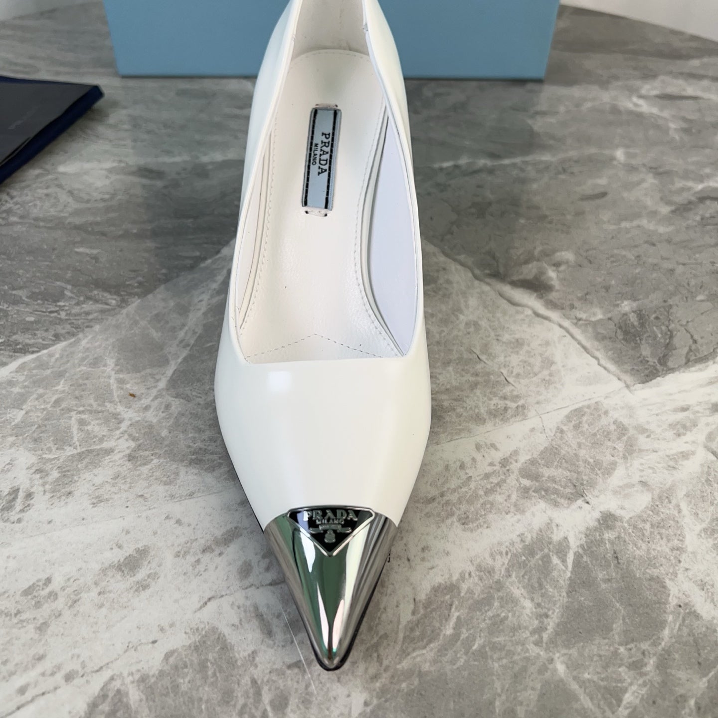 PRADA 25S METAL-CAPPED POINTED-TOE HIGH HEELS IN WHITE CALFSKIN - 34