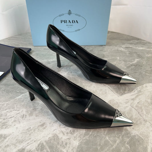 PRADA 25S METAL-CAPPED POINTED-TOE HIGH HEELS IN BLACK CALFSKIN - 34