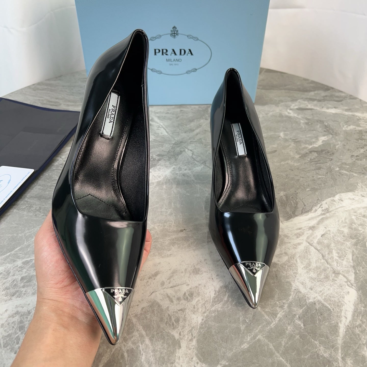 PRADA 25S METAL-CAPPED POINTED-TOE HIGH HEELS IN BLACK CALFSKIN - 34