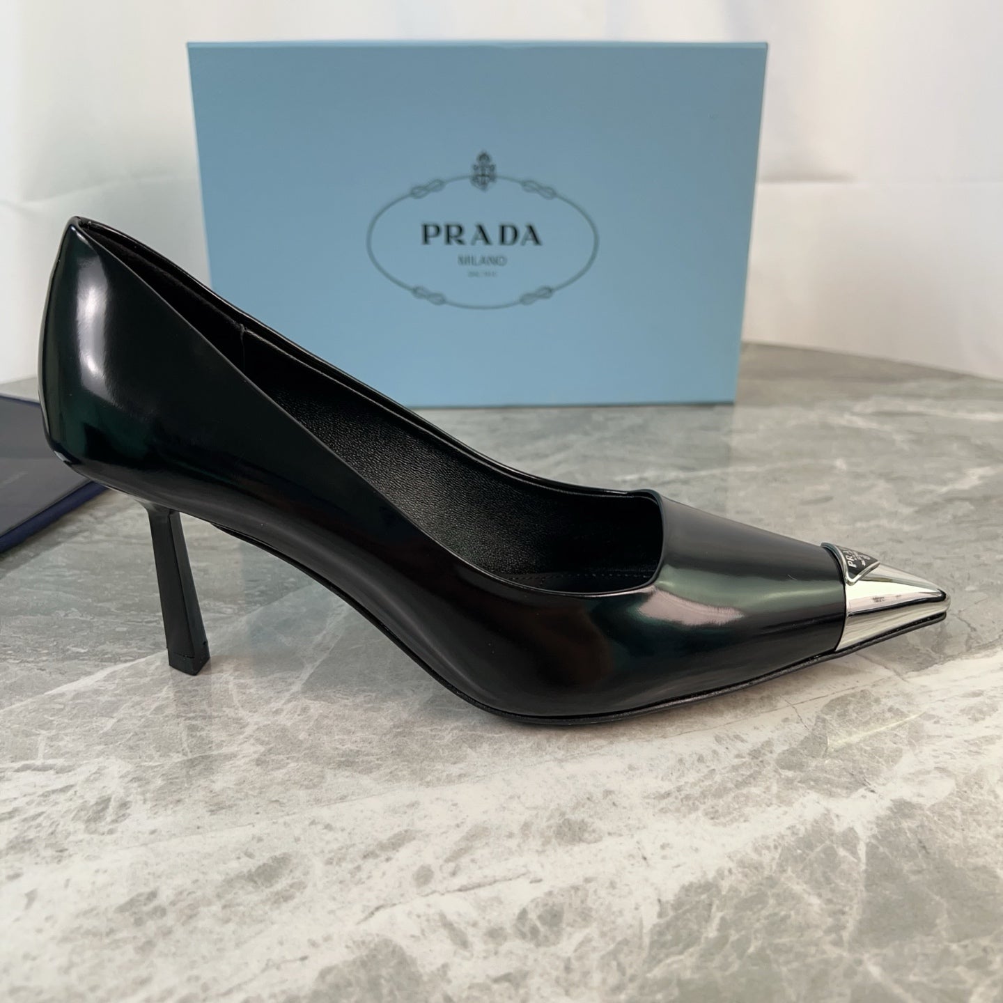 PRADA 25S METAL-CAPPED POINTED-TOE HIGH HEELS IN BLACK CALFSKIN - 34