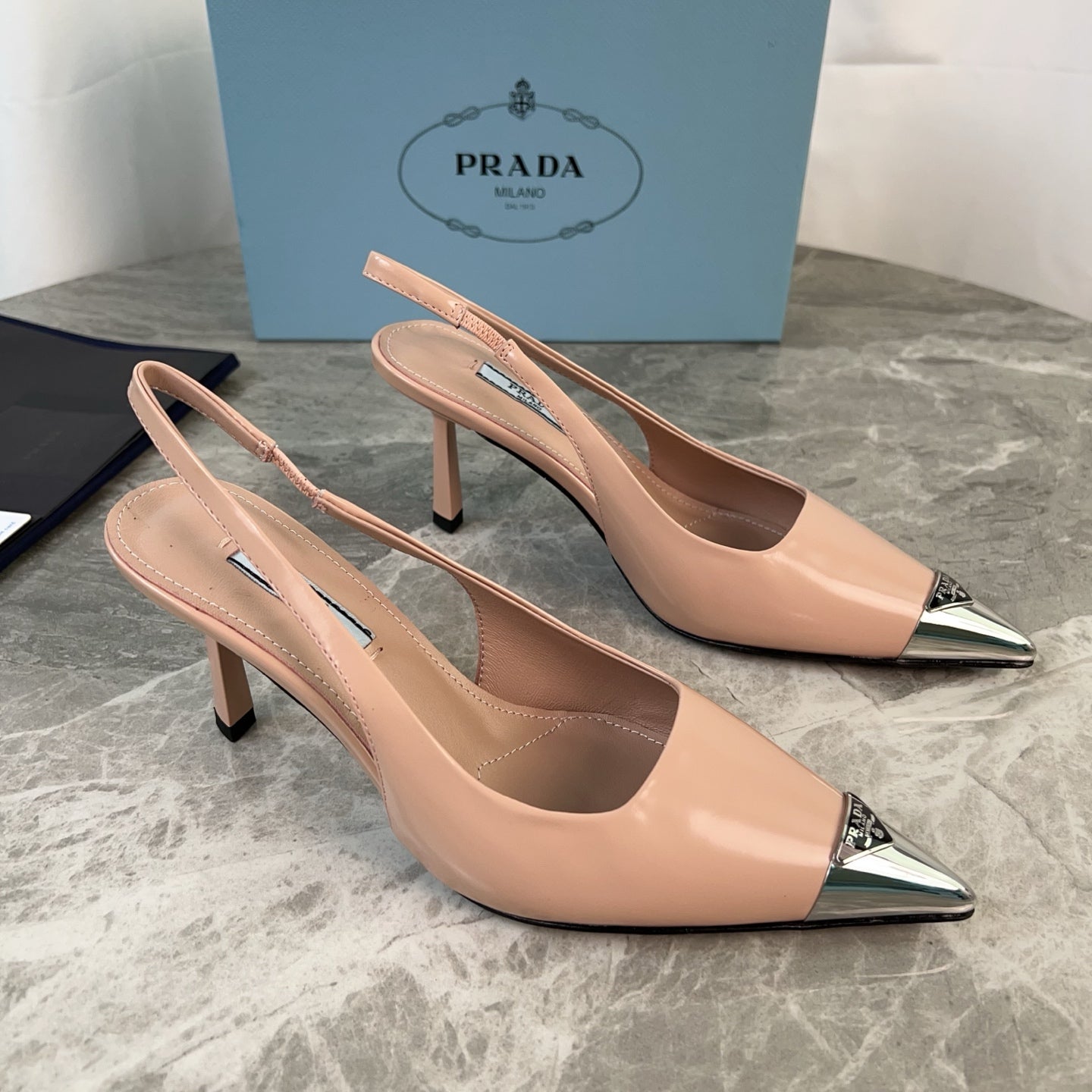 PRADA 25S METAL-TOE SLINGBACK PUMPS IN WARM BEIGE CALFSKIN - 34