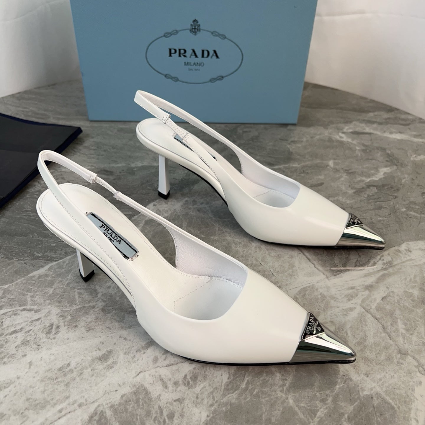 PRADA 25S METAL-TOE SLINGBACK PUMPS IN WHITE CALFSKIN - 34