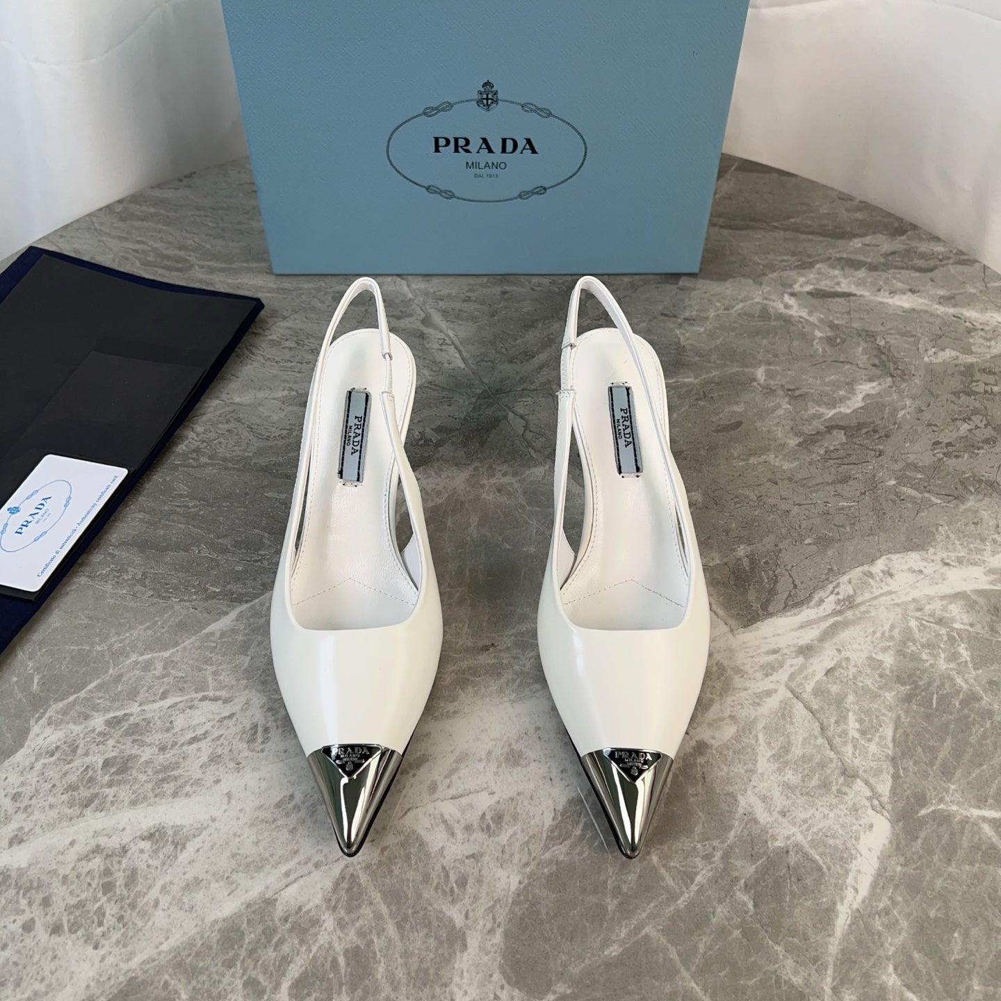 PRADA 25S METAL-TOE SLINGBACK PUMPS IN WHITE CALFSKIN - 34