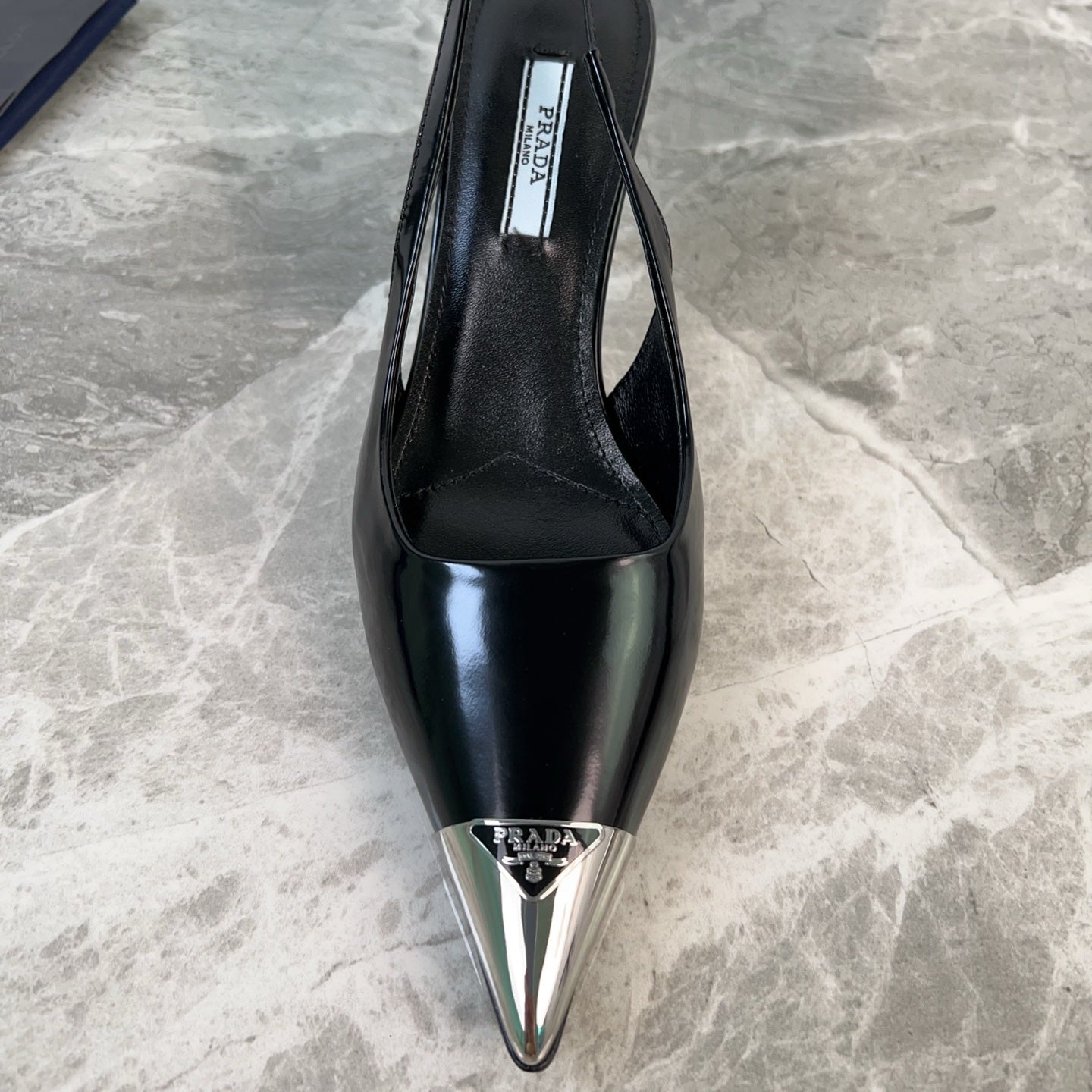 PRADA 25S METAL-TOE SLINGBACK PUMPS IN BLACK CALFSKIN - 34