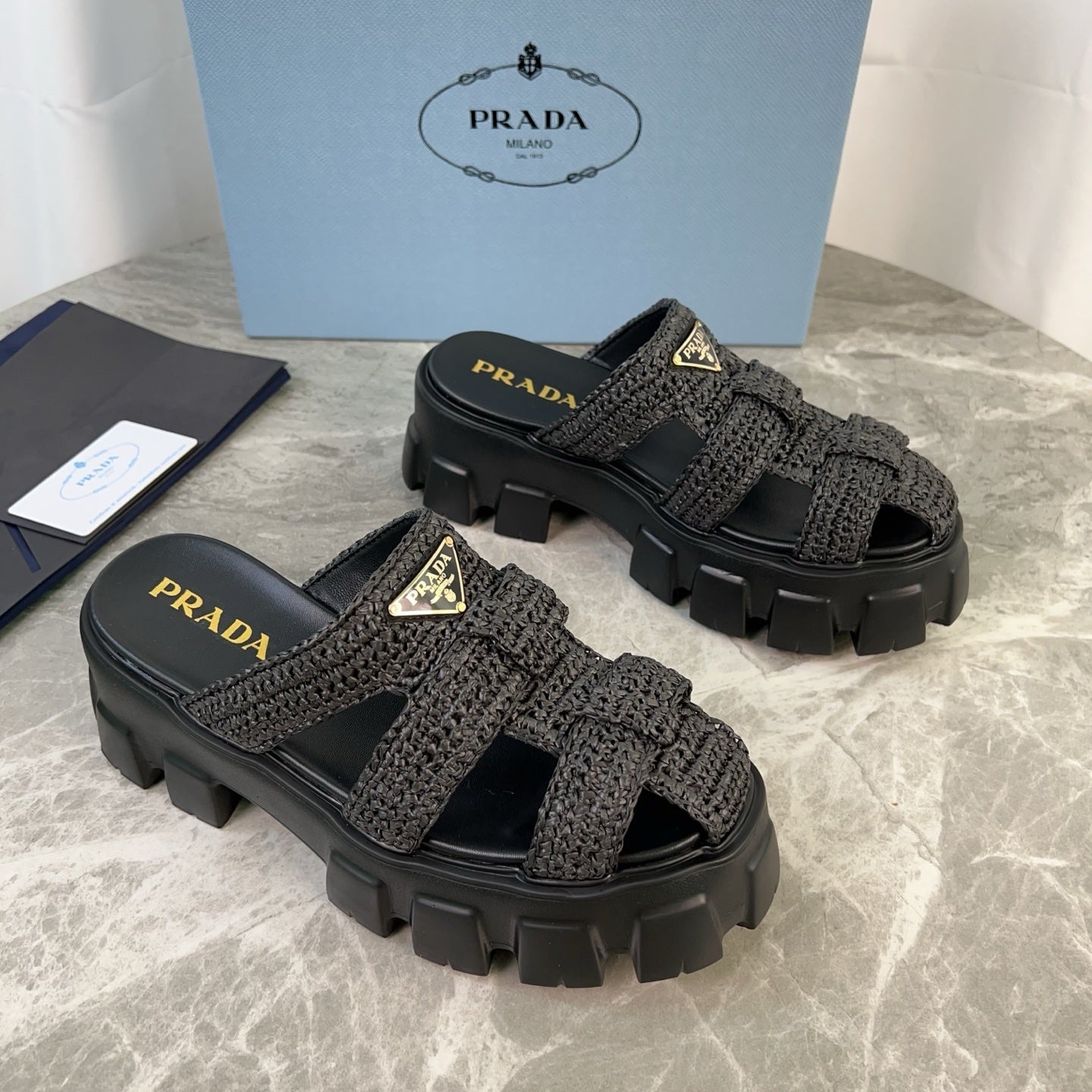 PRADA 25S MONOLITH RUBBER MULES IN BLACK RAFFIA AND LAMBSKIN - 35