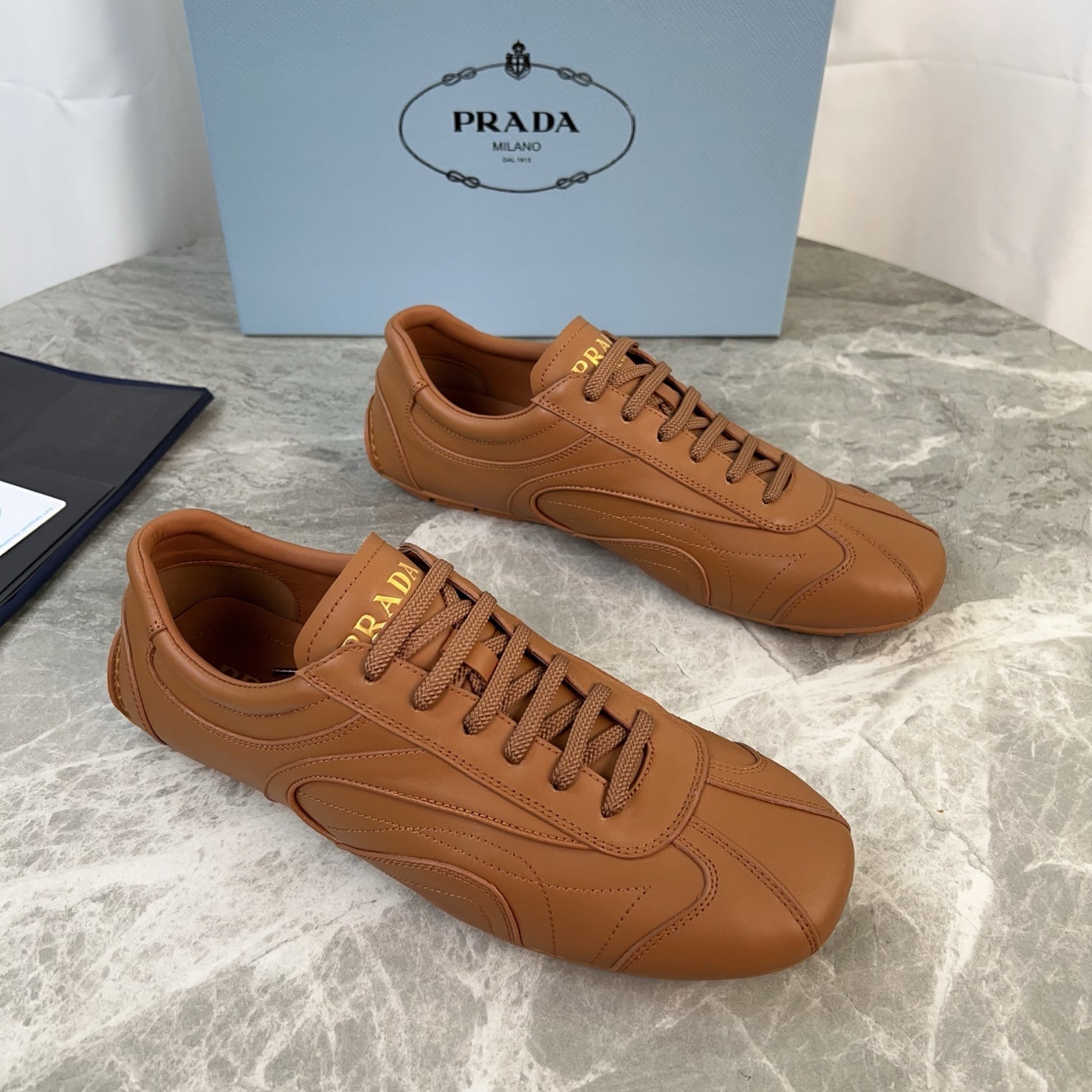 PRADA 25S MONTECARLO ANTIQUED SNEAKERS IN CARAMEL NAPPA LEATHER - 35