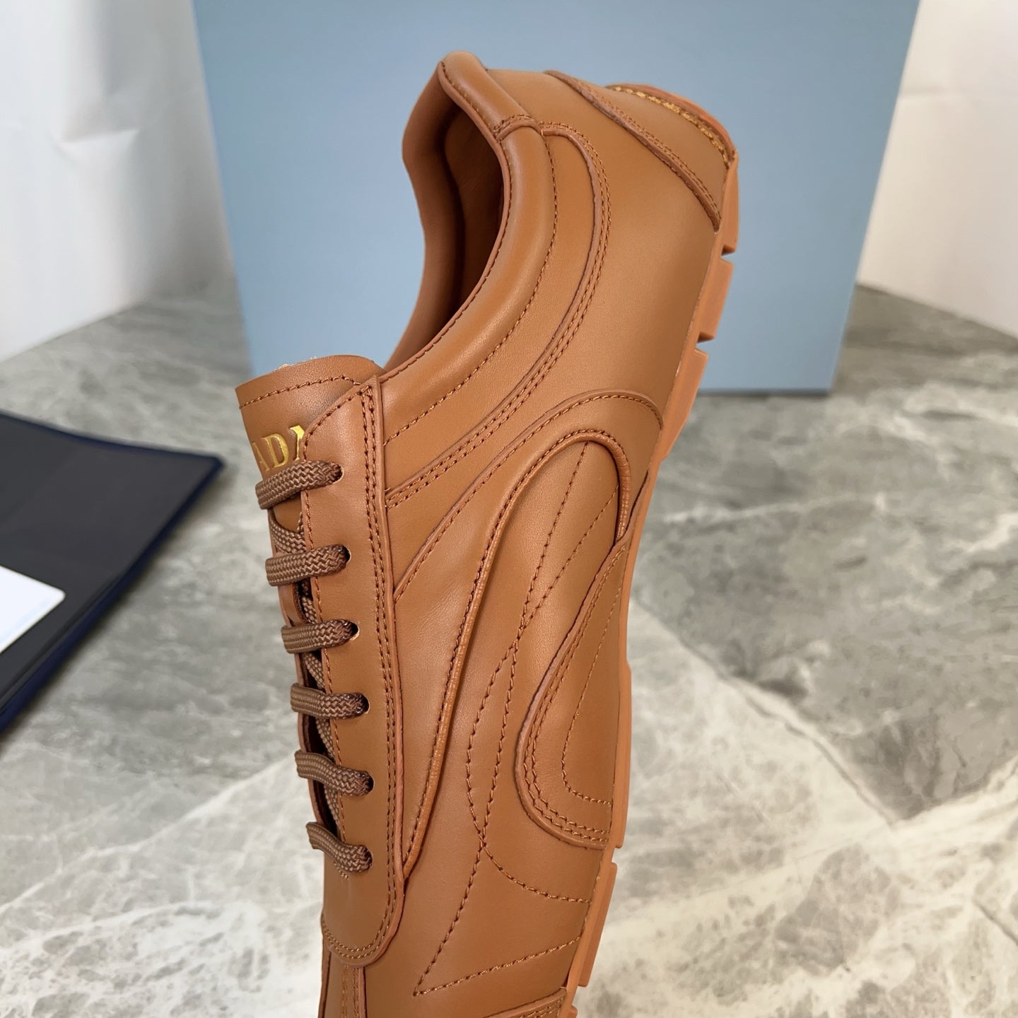 PRADA 25S MONTECARLO ANTIQUED SNEAKERS IN CARAMEL NAPPA LEATHER - 35