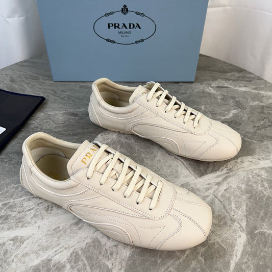 PRADA 25S MONTECARLO ANTIQUED SNEAKERS IN CHALK WHITE NAPPA LEATHER - 35