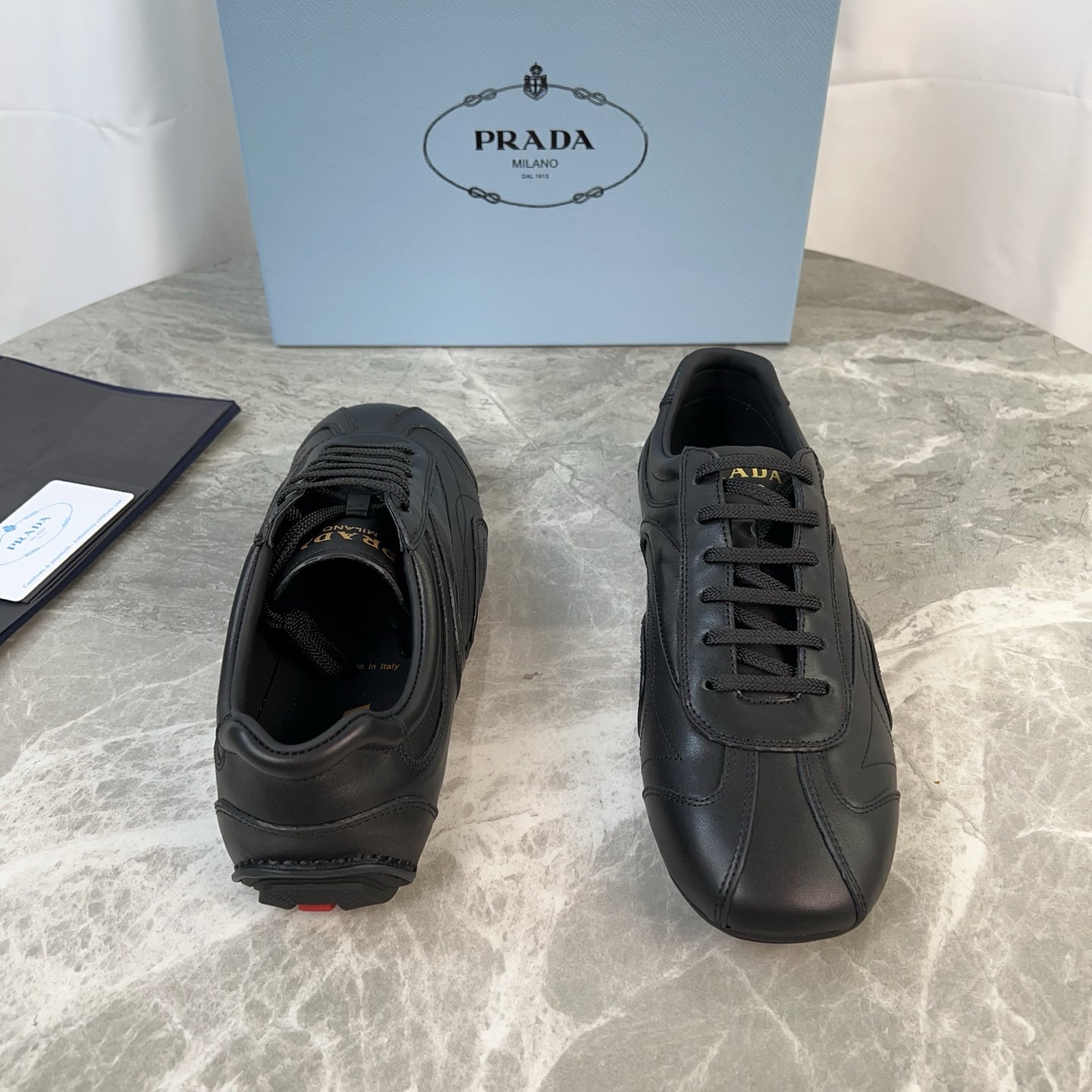 PRADA 25S MONTECARLO ANTIQUED SNEAKERS IN BLACK NAPPA LEATHER - 35
